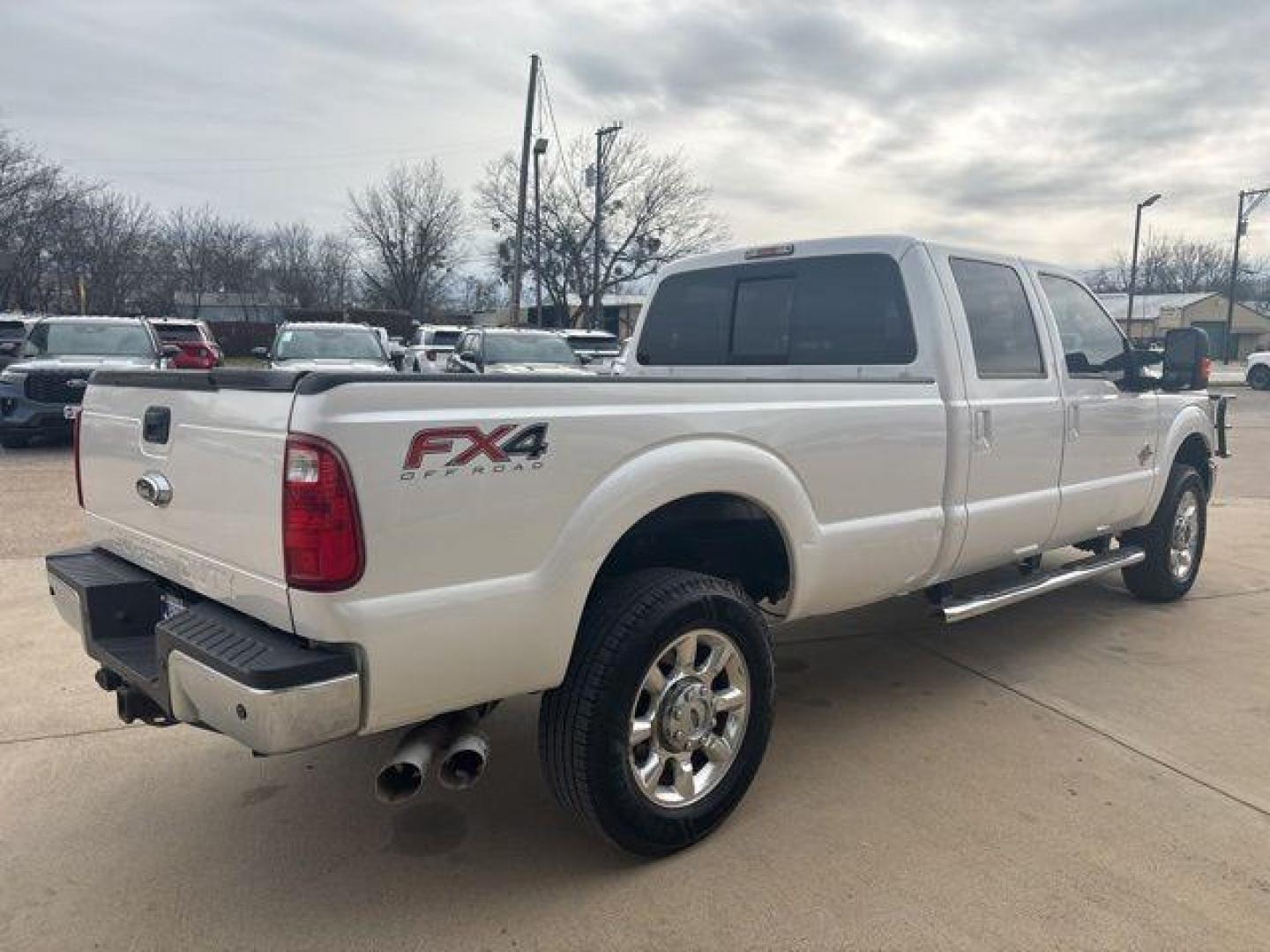 2016 White Platinum Clearcoat Metallic /Black Ford F-350SD Lariat (1FT8W3BT1GE) with an Power Stroke 6.7L V8 DI 32V OHV Turbodiesel engine, Automatic transmission, located at 1105 E Mulberry, Kaufman, TX, 75142, (972) 962-2151, 32.589550, -96.300926 - White Platinum Clearcoat Metallic 2016 Ford F-350SD 4D Crew Cab Lariat 4WD TorqShift 6-Speed Automatic Power Stroke 6.7L V8 DI 32V OHV Turbodiesel 4WD.<br><br><br>Odometer is 38623 miles below market average!<br><br>Awards:<br> * 2016 KBB.com Brand Image Awards go<br>Please call Paul Murrey Ford In - Photo#4