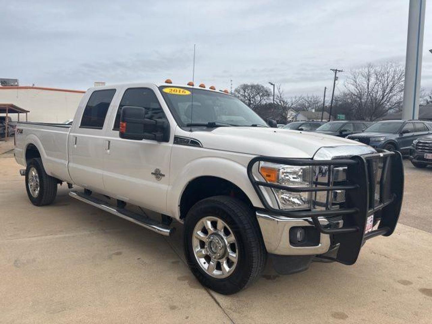 2016 White Platinum Clearcoat Metallic /Black Ford F-350SD Lariat (1FT8W3BT1GE) with an Power Stroke 6.7L V8 DI 32V OHV Turbodiesel engine, Automatic transmission, located at 1105 E Mulberry, Kaufman, TX, 75142, (972) 962-2151, 32.589550, -96.300926 - White Platinum Clearcoat Metallic 2016 Ford F-350SD 4D Crew Cab Lariat 4WD TorqShift 6-Speed Automatic Power Stroke 6.7L V8 DI 32V OHV Turbodiesel 4WD.<br><br><br>Odometer is 38623 miles below market average!<br><br>Awards:<br> * 2016 KBB.com Brand Image Awards go<br>Please call Paul Murrey Ford In - Photo#5