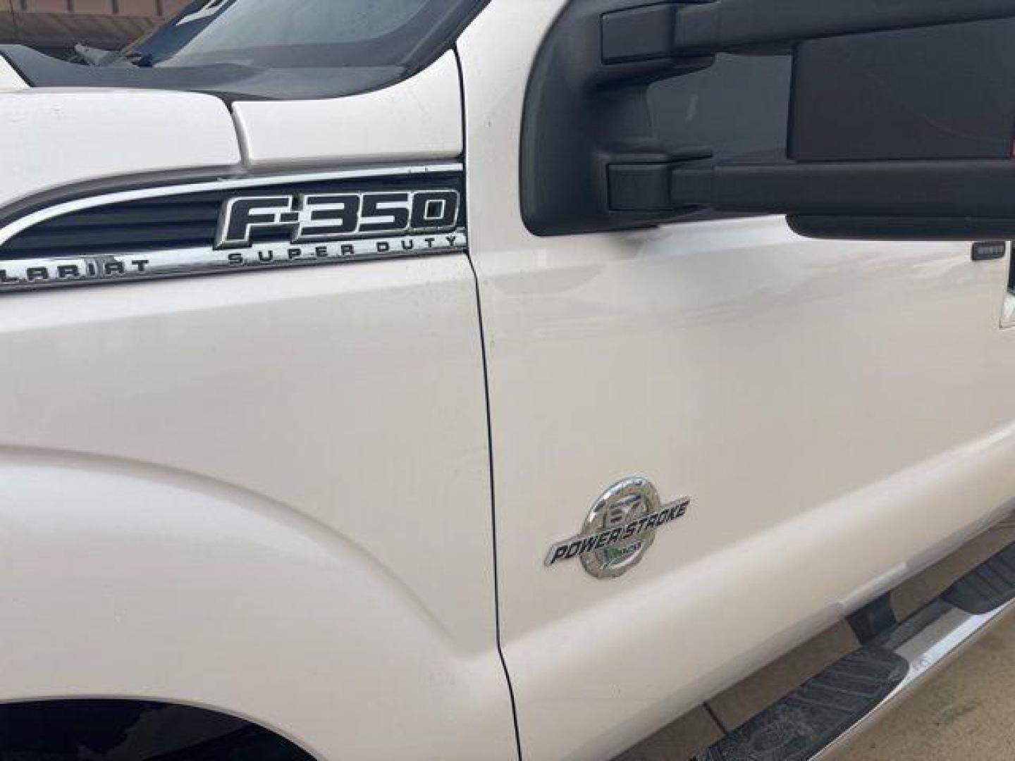 2016 White Platinum Clearcoat Metallic /Black Ford F-350SD Lariat (1FT8W3BT1GE) with an Power Stroke 6.7L V8 DI 32V OHV Turbodiesel engine, Automatic transmission, located at 1105 E Mulberry, Kaufman, TX, 75142, (972) 962-2151, 32.589550, -96.300926 - White Platinum Clearcoat Metallic 2016 Ford F-350SD 4D Crew Cab Lariat 4WD TorqShift 6-Speed Automatic Power Stroke 6.7L V8 DI 32V OHV Turbodiesel 4WD.<br><br><br>Odometer is 38623 miles below market average!<br><br>Awards:<br> * 2016 KBB.com Brand Image Awards go<br>Please call Paul Murrey Ford In - Photo#7