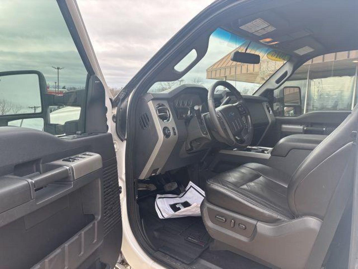 2016 White Platinum Clearcoat Metallic /Black Ford F-350SD Lariat (1FT8W3BT1GE) with an Power Stroke 6.7L V8 DI 32V OHV Turbodiesel engine, Automatic transmission, located at 1105 E Mulberry, Kaufman, TX, 75142, (972) 962-2151, 32.589550, -96.300926 - White Platinum Clearcoat Metallic 2016 Ford F-350SD 4D Crew Cab Lariat 4WD TorqShift 6-Speed Automatic Power Stroke 6.7L V8 DI 32V OHV Turbodiesel 4WD.<br><br><br>Odometer is 38623 miles below market average!<br><br>Awards:<br> * 2016 KBB.com Brand Image Awards go<br>Please call Paul Murrey Ford In - Photo#8