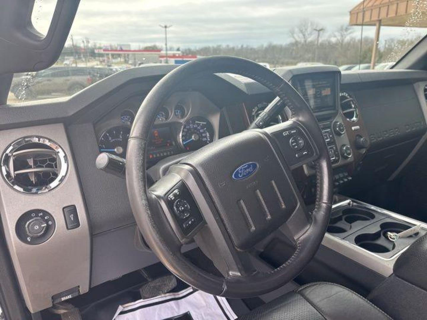 2016 White Platinum Clearcoat Metallic /Black Ford F-350SD Lariat (1FT8W3BT1GE) with an Power Stroke 6.7L V8 DI 32V OHV Turbodiesel engine, Automatic transmission, located at 1105 E Mulberry, Kaufman, TX, 75142, (972) 962-2151, 32.589550, -96.300926 - White Platinum Clearcoat Metallic 2016 Ford F-350SD 4D Crew Cab Lariat 4WD TorqShift 6-Speed Automatic Power Stroke 6.7L V8 DI 32V OHV Turbodiesel 4WD.<br><br><br>Odometer is 38623 miles below market average!<br><br>Awards:<br> * 2016 KBB.com Brand Image Awards go<br>Please call Paul Murrey Ford In - Photo#11
