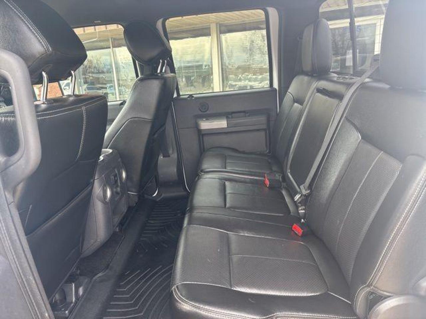 2016 White Platinum Clearcoat Metallic /Black Ford F-350SD Lariat (1FT8W3BT1GE) with an Power Stroke 6.7L V8 DI 32V OHV Turbodiesel engine, Automatic transmission, located at 1105 E Mulberry, Kaufman, TX, 75142, (972) 962-2151, 32.589550, -96.300926 - White Platinum Clearcoat Metallic 2016 Ford F-350SD 4D Crew Cab Lariat 4WD TorqShift 6-Speed Automatic Power Stroke 6.7L V8 DI 32V OHV Turbodiesel 4WD.<br><br><br>Odometer is 38623 miles below market average!<br><br>Awards:<br> * 2016 KBB.com Brand Image Awards go<br>Please call Paul Murrey Ford In - Photo#13