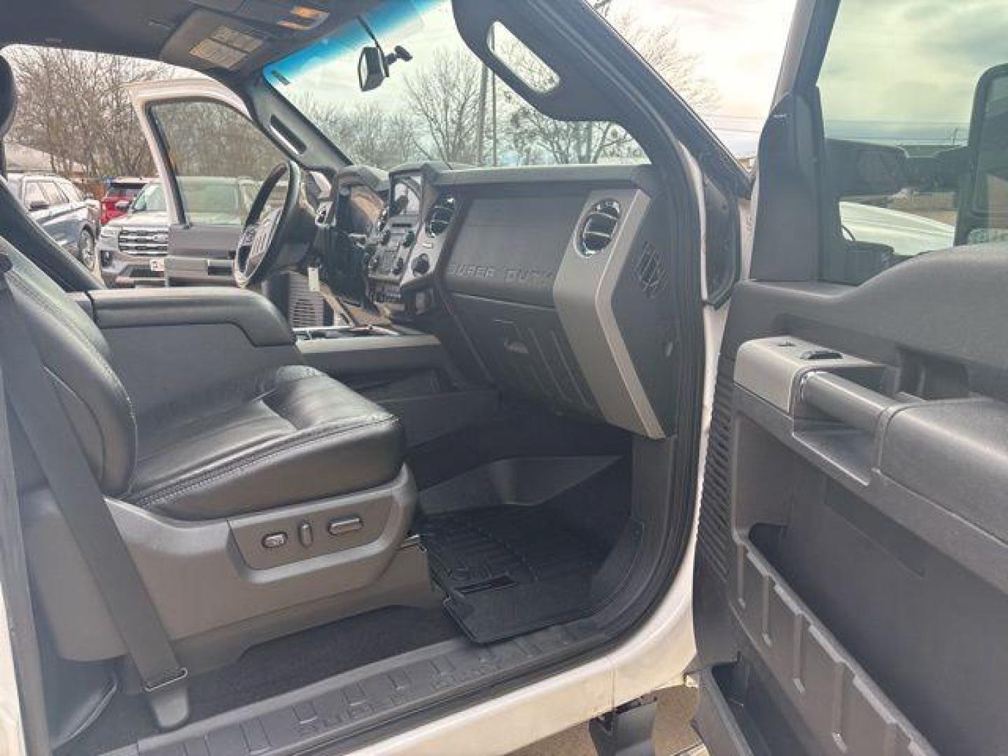 2016 White Platinum Clearcoat Metallic /Black Ford F-350SD Lariat (1FT8W3BT1GE) with an Power Stroke 6.7L V8 DI 32V OHV Turbodiesel engine, Automatic transmission, located at 1105 E Mulberry, Kaufman, TX, 75142, (972) 962-2151, 32.589550, -96.300926 - White Platinum Clearcoat Metallic 2016 Ford F-350SD 4D Crew Cab Lariat 4WD TorqShift 6-Speed Automatic Power Stroke 6.7L V8 DI 32V OHV Turbodiesel 4WD.<br><br><br>Odometer is 38623 miles below market average!<br><br>Awards:<br> * 2016 KBB.com Brand Image Awards go<br>Please call Paul Murrey Ford In - Photo#14