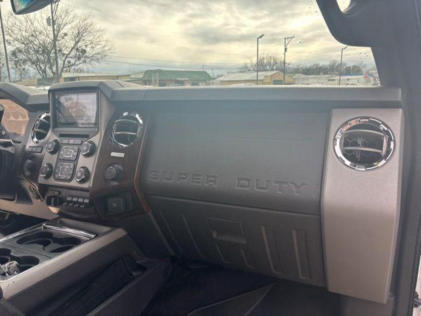 2016 White Platinum Clearcoat Metallic /Black Ford F-350SD Lariat (1FT8W3BT1GE) with an Power Stroke 6.7L V8 DI 32V OHV Turbodiesel engine, Automatic transmission, located at 1105 E Mulberry, Kaufman, TX, 75142, (972) 962-2151, 32.589550, -96.300926 - White Platinum Clearcoat Metallic 2016 Ford F-350SD 4D Crew Cab Lariat 4WD TorqShift 6-Speed Automatic Power Stroke 6.7L V8 DI 32V OHV Turbodiesel 4WD.<br><br><br>Odometer is 38623 miles below market average!<br><br>Awards:<br> * 2016 KBB.com Brand Image Awards go<br>Please call Paul Murrey Ford In - Photo#16
