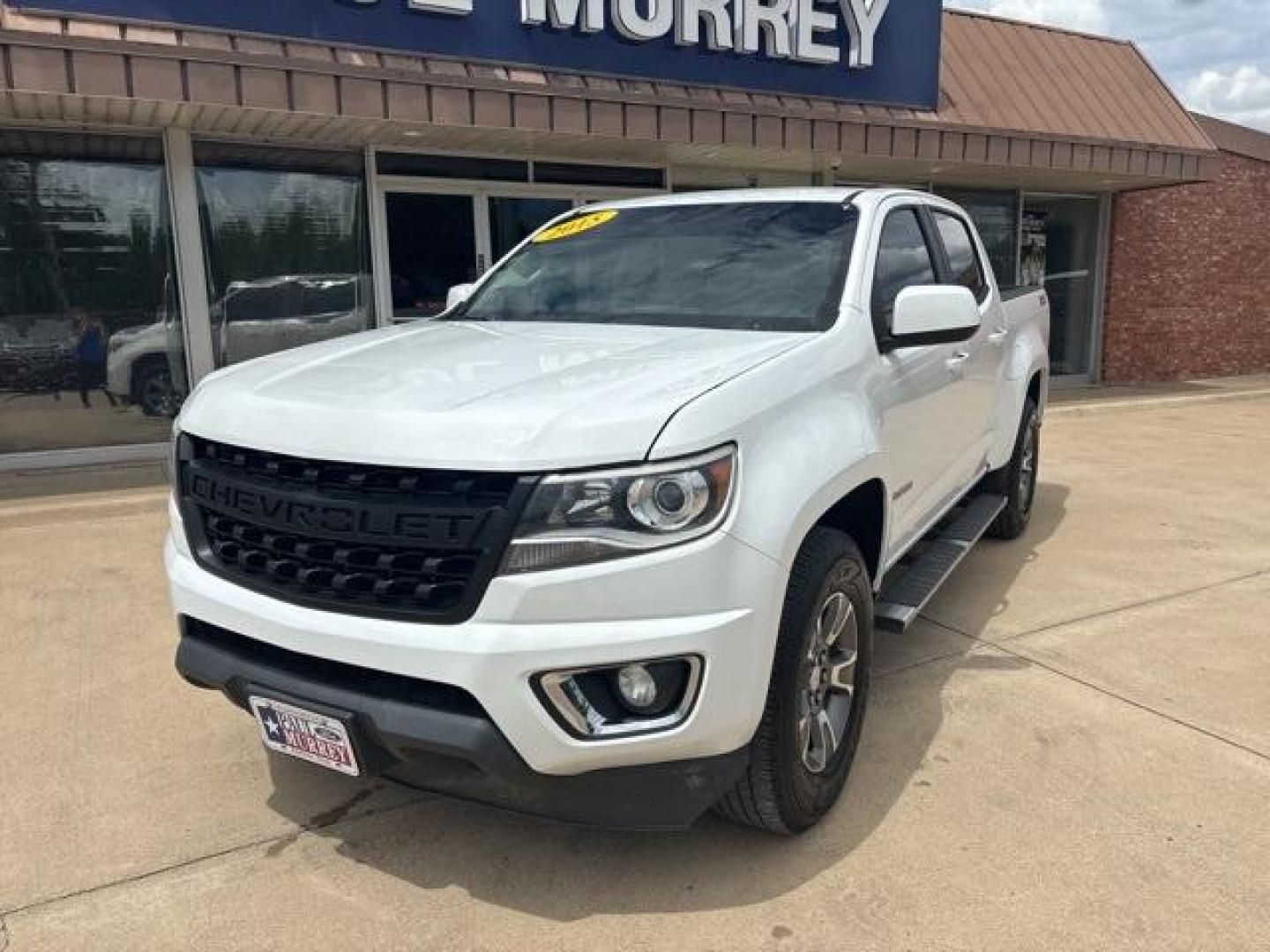 2015 Summit White /Black Chevrolet Colorado Z71 (1GCGTCE32F1) with an 3.6L V6 DGI DOHC VVT engine, Automatic transmission, located at 1105 E Mulberry, Kaufman, TX, 75142, (972) 962-2151, 32.589550, -96.300926 - Summit White 2015 Chevrolet Colorado 4D Crew Cab Z71 4WD 6-Speed Automatic 3.6L V6 DGI DOHC VVT 4WD.<br><br><br>Recent Arrival!<br><br>Awards:<br> * 2015 KBB.com Best Resale Value Awards * 2015 KBB.com Best Buy Awards Finalist<br>Please call Paul Murrey Ford Inc. In Kaufman Texas A Family Dealers - Photo#1