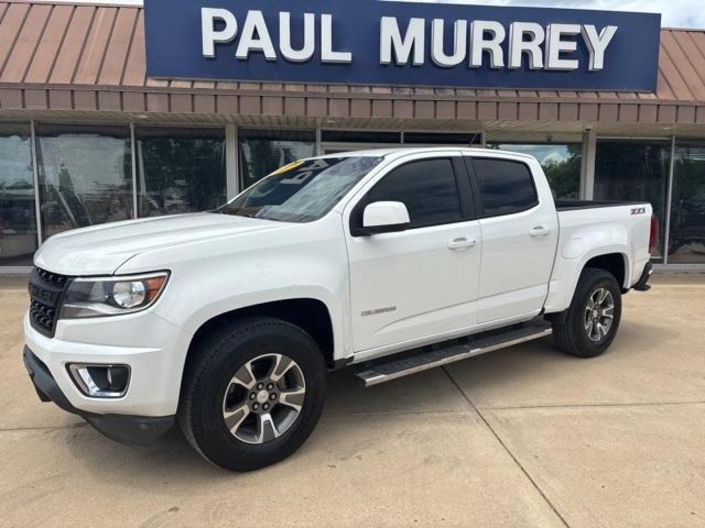 2015 Summit White /Black Chevrolet Colorado Z71 (1GCGTCE32F1) with an 3.6L V6 DGI DOHC VVT engine, Automatic transmission, located at 1105 E Mulberry, Kaufman, TX, 75142, (972) 962-2151, 32.589550, -96.300926 - Summit White 2015 Chevrolet Colorado 4D Crew Cab Z71 4WD 6-Speed Automatic 3.6L V6 DGI DOHC VVT 4WD.<br><br><br>Recent Arrival!<br><br>Awards:<br> * 2015 KBB.com Best Resale Value Awards * 2015 KBB.com Best Buy Awards Finalist<br>Please call Paul Murrey Ford Inc. In Kaufman Texas A Family Dealers - Photo#2
