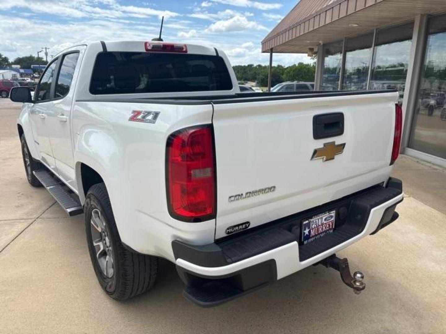 2015 Summit White /Black Chevrolet Colorado Z71 (1GCGTCE32F1) with an 3.6L V6 DGI DOHC VVT engine, Automatic transmission, located at 1105 E Mulberry, Kaufman, TX, 75142, (972) 962-2151, 32.589550, -96.300926 - Summit White 2015 Chevrolet Colorado 4D Crew Cab Z71 4WD 6-Speed Automatic 3.6L V6 DGI DOHC VVT 4WD.<br><br><br>Recent Arrival!<br><br>Awards:<br> * 2015 KBB.com Best Resale Value Awards * 2015 KBB.com Best Buy Awards Finalist<br>Please call Paul Murrey Ford Inc. In Kaufman Texas A Family Dealers - Photo#3