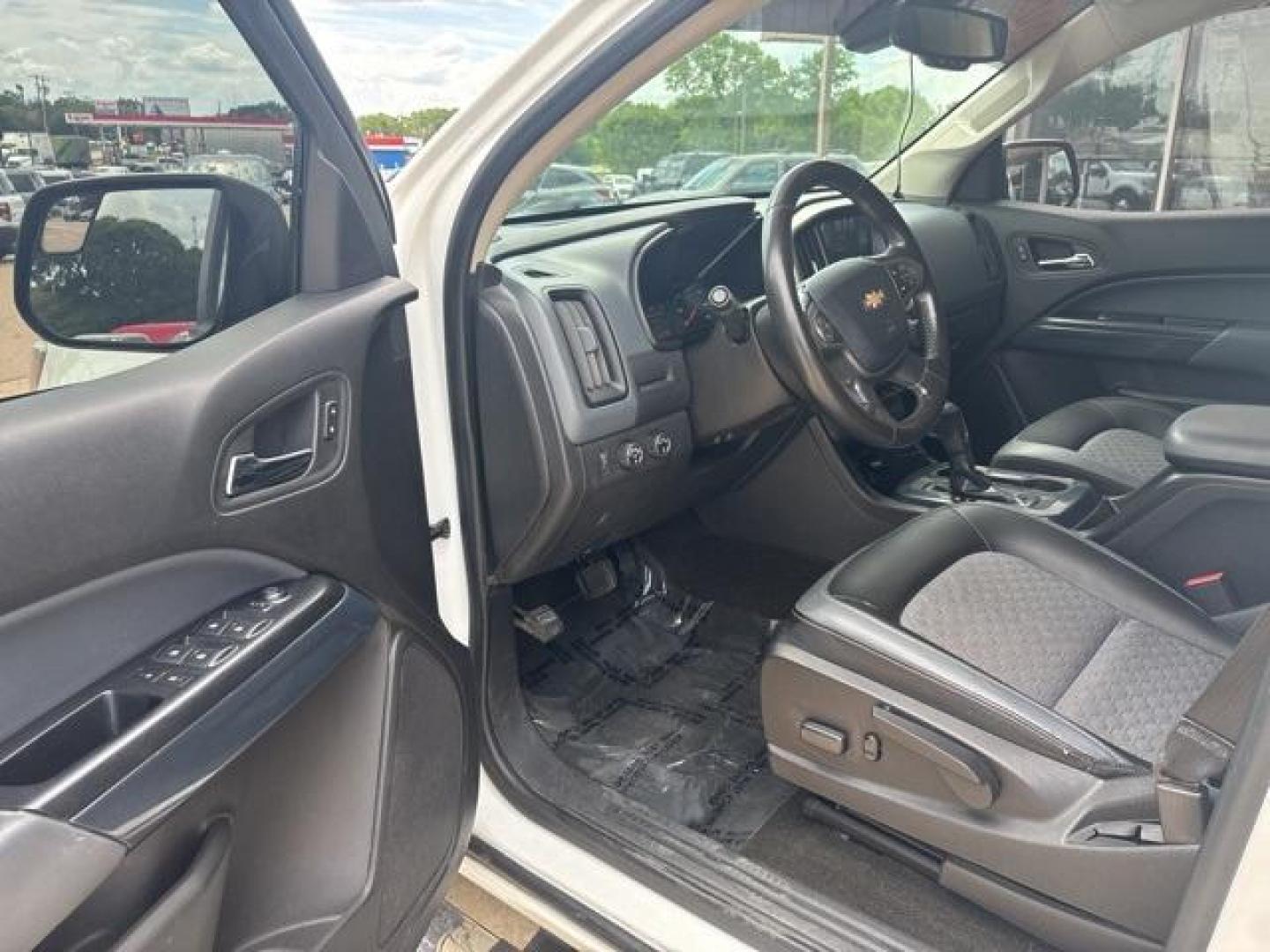 2015 Summit White /Black Chevrolet Colorado Z71 (1GCGTCE32F1) with an 3.6L V6 DGI DOHC VVT engine, Automatic transmission, located at 1105 E Mulberry, Kaufman, TX, 75142, (972) 962-2151, 32.589550, -96.300926 - Summit White 2015 Chevrolet Colorado 4D Crew Cab Z71 4WD 6-Speed Automatic 3.6L V6 DGI DOHC VVT 4WD.<br><br><br>Recent Arrival!<br><br>Awards:<br> * 2015 KBB.com Best Resale Value Awards * 2015 KBB.com Best Buy Awards Finalist<br>Please call Paul Murrey Ford Inc. In Kaufman Texas A Family Dealers - Photo#9