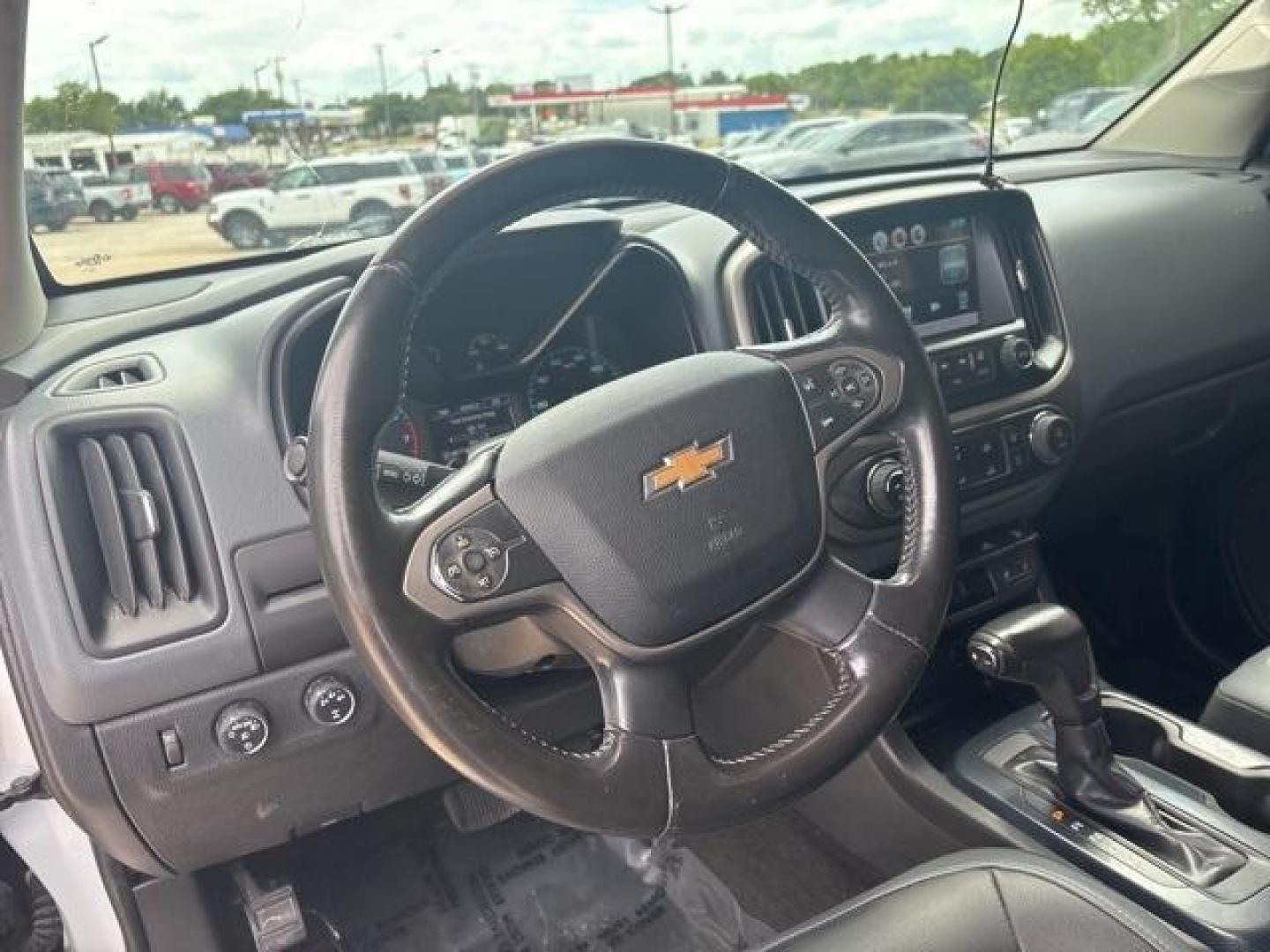 2015 Summit White /Black Chevrolet Colorado Z71 (1GCGTCE32F1) with an 3.6L V6 DGI DOHC VVT engine, Automatic transmission, located at 1105 E Mulberry, Kaufman, TX, 75142, (972) 962-2151, 32.589550, -96.300926 - Summit White 2015 Chevrolet Colorado 4D Crew Cab Z71 4WD 6-Speed Automatic 3.6L V6 DGI DOHC VVT 4WD.<br><br><br>Recent Arrival!<br><br>Awards:<br> * 2015 KBB.com Best Resale Value Awards * 2015 KBB.com Best Buy Awards Finalist<br>Please call Paul Murrey Ford Inc. In Kaufman Texas A Family Dealers - Photo#12