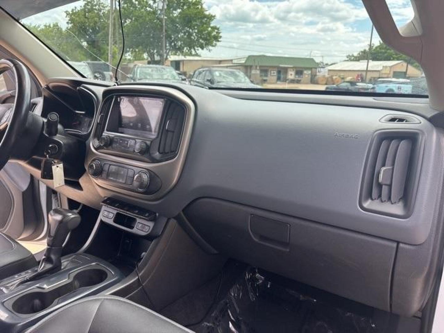 2015 Summit White /Black Chevrolet Colorado Z71 (1GCGTCE32F1) with an 3.6L V6 DGI DOHC VVT engine, Automatic transmission, located at 1105 E Mulberry, Kaufman, TX, 75142, (972) 962-2151, 32.589550, -96.300926 - Summit White 2015 Chevrolet Colorado 4D Crew Cab Z71 4WD 6-Speed Automatic 3.6L V6 DGI DOHC VVT 4WD.<br><br><br>Recent Arrival!<br><br>Awards:<br> * 2015 KBB.com Best Resale Value Awards * 2015 KBB.com Best Buy Awards Finalist<br>Please call Paul Murrey Ford Inc. In Kaufman Texas A Family Dealers - Photo#19