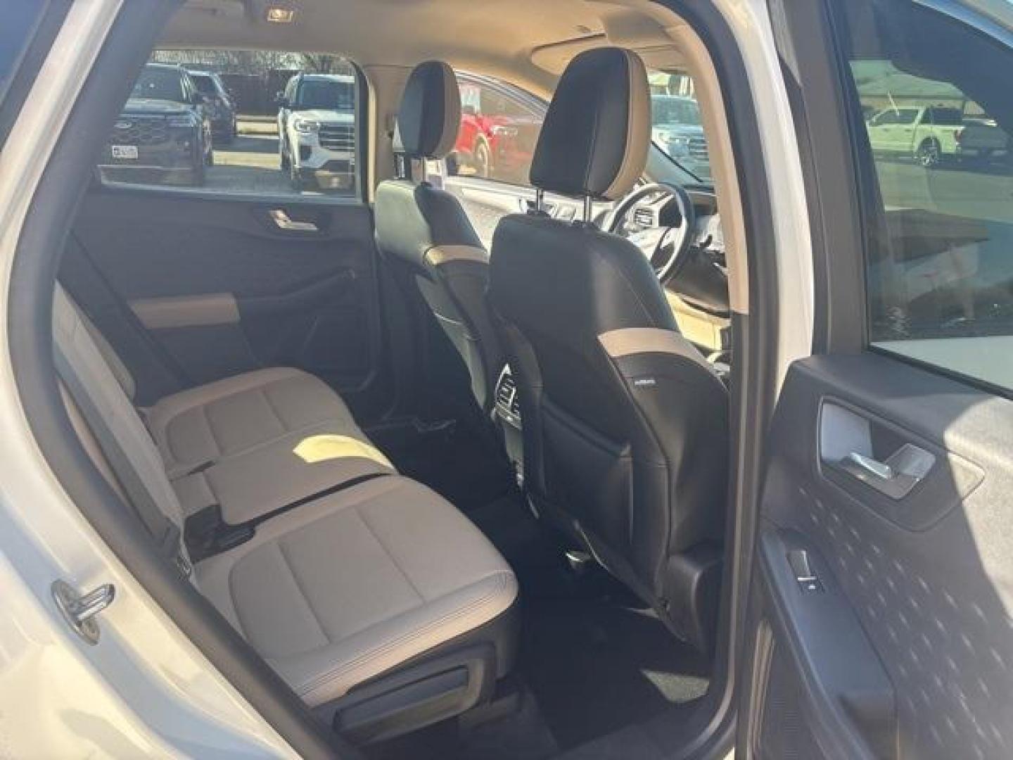 2020 White /Sandstone Ford Escape SEL (1FMCU0H61LU) with an 1.5L EcoBoost engine, Automatic transmission, located at 1105 E Mulberry, Kaufman, TX, 75142, (972) 962-2151, 32.589550, -96.300926 - White 2020 Ford Escape 4D Sport Utility SEL FWD 8-Speed Automatic 1.5L EcoBoost<br><br><br>Odometer is 13324 miles below market average! 27/33 City/Highway MPG<br><br>Awards:<br> * JD Power Automotive Performance, Execution and Layout (APEAL) Study<br>Please call Paul Murrey Ford Inc. In Kaufman Te - Photo#17