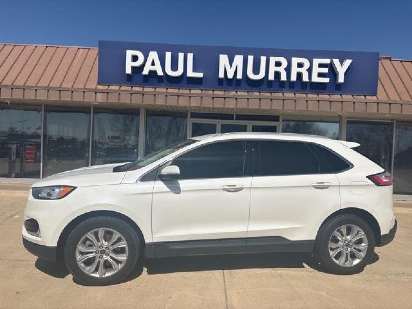 2021 White /Ceramic Ford Edge Titanium (2FMPK3K99MB) with an EcoBoost 2.0L I4 GTDi DOHC Turbocharged VCT engine, Automatic transmission, located at 1105 E Mulberry, Kaufman, TX, 75142, (972) 962-2151, 32.589550, -96.300926 - White 2021 Ford Edge 4D Sport Utility Titanium FWD 8-Speed Automatic EcoBoost 2.0L I4 GTDi DOHC Turbocharged VCT<br><br><br>Recent Arrival! 21/29 City/Highway MPG<br><br><br>Please call Paul Murrey Ford Inc. In Kaufman Texas A Family Dealership Since 1952 Serving the Dallas Fort Worth and East Texas - Photo#0