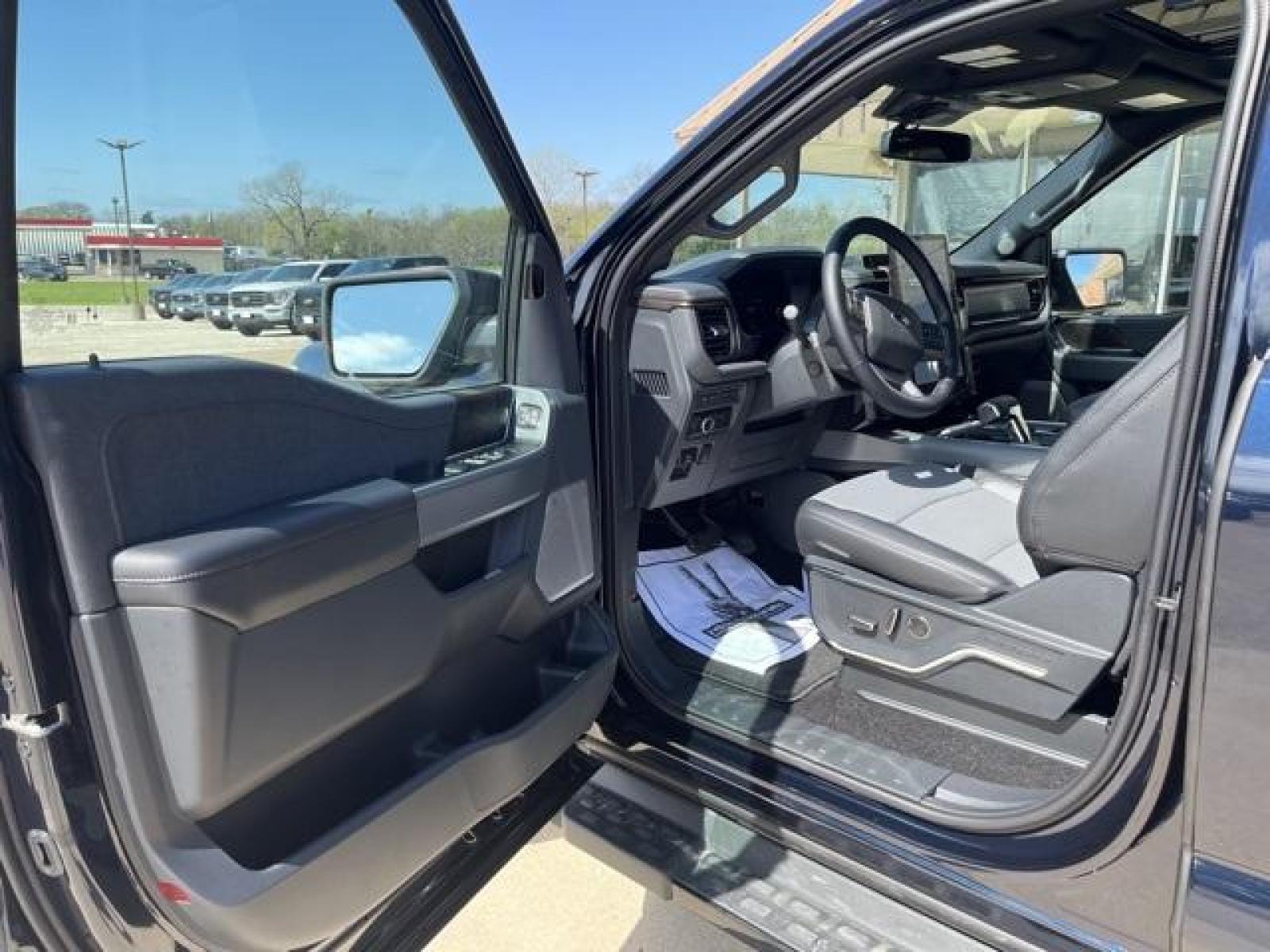 2023 Antimatter Blue Metallic /Black Ford F-150 Lightning Lariat (1FT6W1EVXPW) with an Electric ZEV 426hp engine, Automatic transmission, located at 1105 E Mulberry, Kaufman, TX, 75142, (972) 962-2151, 32.589550, -96.300926 - Antimatter Blue Metallic 2023 Ford F-150 Lightning 4D Crew Cab Lariat AWD Single-Speed Automatic Electric ZEV 426hp<br><br>78/63 City/Highway MPG<br><br><br>Please call Paul Murrey Ford Inc. In Kaufman Texas A Family Dealership Since 1952 Serving the Dallas Fort Worth and East Texas areas for over 7 - Photo #16