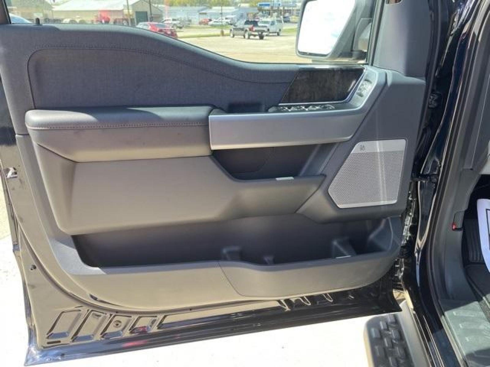 2023 Antimatter Blue Metallic /Black Ford F-150 Lightning Lariat (1FT6W1EVXPW) with an Electric ZEV 426hp engine, Automatic transmission, located at 1105 E Mulberry, Kaufman, TX, 75142, (972) 962-2151, 32.589550, -96.300926 - Antimatter Blue Metallic 2023 Ford F-150 Lightning 4D Crew Cab Lariat AWD Single-Speed Automatic Electric ZEV 426hp<br><br>78/63 City/Highway MPG<br><br><br>Please call Paul Murrey Ford Inc. In Kaufman Texas A Family Dealership Since 1952 Serving the Dallas Fort Worth and East Texas areas for over 7 - Photo #17