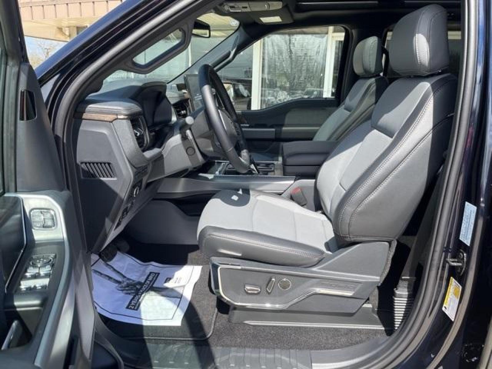 2023 Antimatter Blue Metallic /Black Ford F-150 Lightning Lariat (1FT6W1EVXPW) with an Electric ZEV 426hp engine, Automatic transmission, located at 1105 E Mulberry, Kaufman, TX, 75142, (972) 962-2151, 32.589550, -96.300926 - Antimatter Blue Metallic 2023 Ford F-150 Lightning 4D Crew Cab Lariat AWD Single-Speed Automatic Electric ZEV 426hp<br><br>78/63 City/Highway MPG<br><br><br>Please call Paul Murrey Ford Inc. In Kaufman Texas A Family Dealership Since 1952 Serving the Dallas Fort Worth and East Texas areas for over 7 - Photo #18