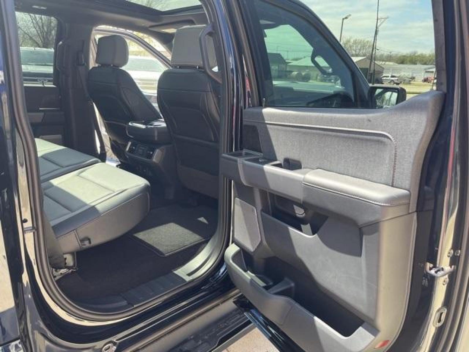 2023 Antimatter Blue Metallic /Black Ford F-150 Lightning Lariat (1FT6W1EVXPW) with an Electric ZEV 426hp engine, Automatic transmission, located at 1105 E Mulberry, Kaufman, TX, 75142, (972) 962-2151, 32.589550, -96.300926 - Antimatter Blue Metallic 2023 Ford F-150 Lightning 4D Crew Cab Lariat AWD Single-Speed Automatic Electric ZEV 426hp<br><br>78/63 City/Highway MPG<br><br><br>Please call Paul Murrey Ford Inc. In Kaufman Texas A Family Dealership Since 1952 Serving the Dallas Fort Worth and East Texas areas for over 7 - Photo #32