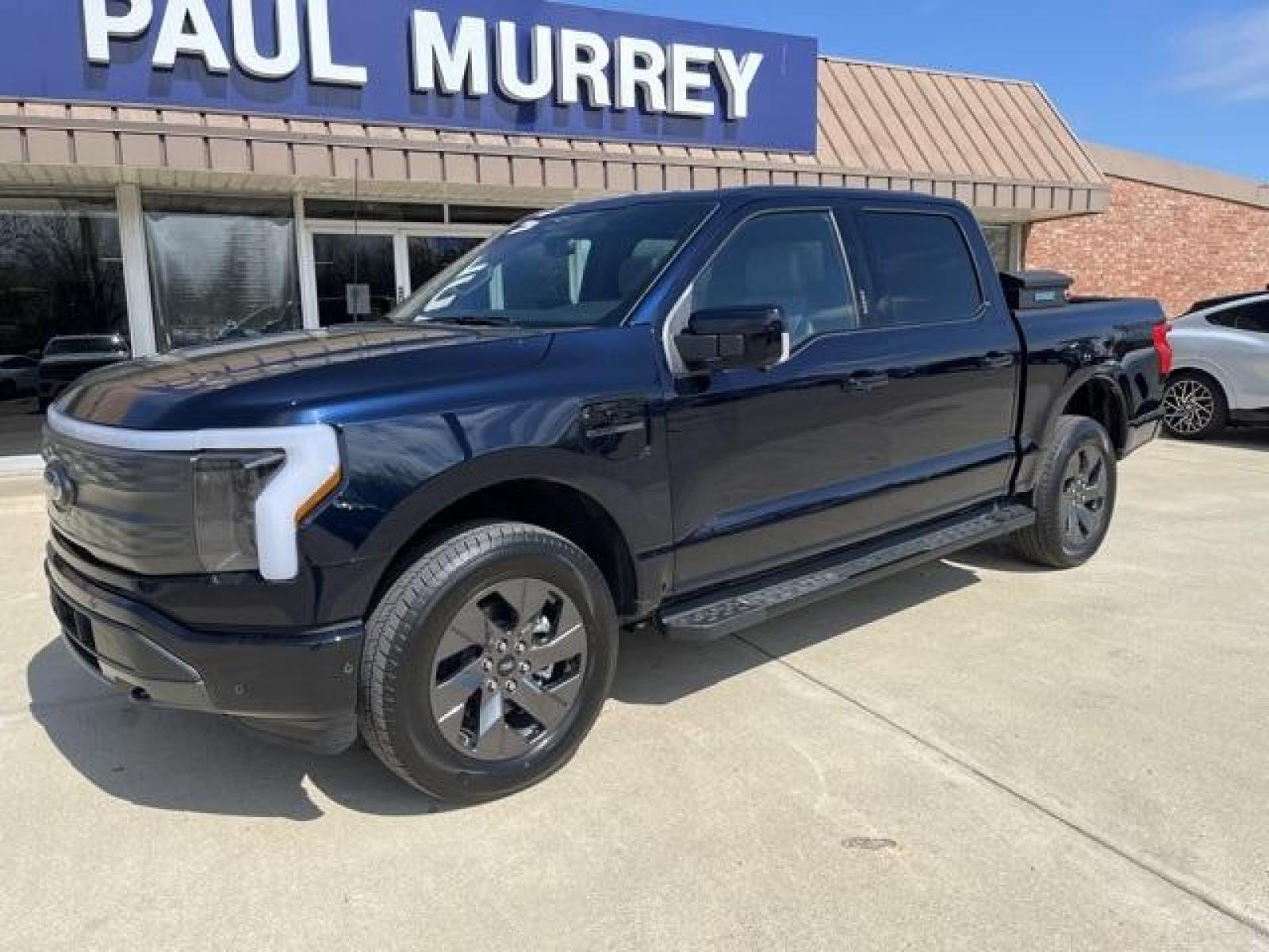 2023 Antimatter Blue Metallic /Black Ford F-150 Lightning Lariat (1FT6W1EVXPW) with an Electric ZEV 426hp engine, Automatic transmission, located at 1105 E Mulberry, Kaufman, TX, 75142, (972) 962-2151, 32.589550, -96.300926 - Antimatter Blue Metallic 2023 Ford F-150 Lightning 4D Crew Cab Lariat AWD Single-Speed Automatic Electric ZEV 426hp<br><br>78/63 City/Highway MPG<br><br><br>Please call Paul Murrey Ford Inc. In Kaufman Texas A Family Dealership Since 1952 Serving the Dallas Fort Worth and East Texas areas for over 7 - Photo #2