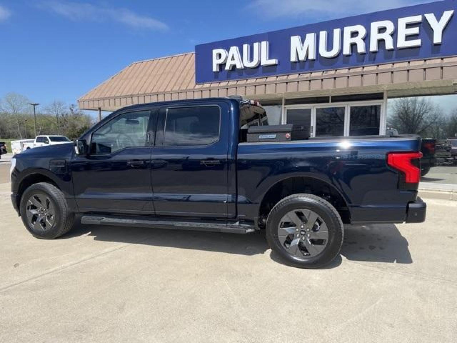 2023 Antimatter Blue Metallic /Black Ford F-150 Lightning Lariat (1FT6W1EVXPW) with an Electric ZEV 426hp engine, Automatic transmission, located at 1105 E Mulberry, Kaufman, TX, 75142, (972) 962-2151, 32.589550, -96.300926 - Antimatter Blue Metallic 2023 Ford F-150 Lightning 4D Crew Cab Lariat AWD Single-Speed Automatic Electric ZEV 426hp<br><br>78/63 City/Highway MPG<br><br><br>Please call Paul Murrey Ford Inc. In Kaufman Texas A Family Dealership Since 1952 Serving the Dallas Fort Worth and East Texas areas for over 7 - Photo #3