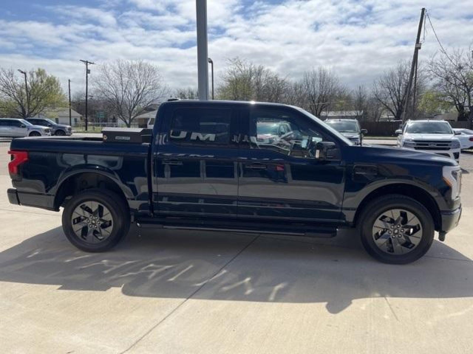 2023 Antimatter Blue Metallic /Black Ford F-150 Lightning Lariat (1FT6W1EVXPW) with an Electric ZEV 426hp engine, Automatic transmission, located at 1105 E Mulberry, Kaufman, TX, 75142, (972) 962-2151, 32.589550, -96.300926 - Antimatter Blue Metallic 2023 Ford F-150 Lightning 4D Crew Cab Lariat AWD Single-Speed Automatic Electric ZEV 426hp<br><br>78/63 City/Highway MPG<br><br><br>Please call Paul Murrey Ford Inc. In Kaufman Texas A Family Dealership Since 1952 Serving the Dallas Fort Worth and East Texas areas for over 7 - Photo #7