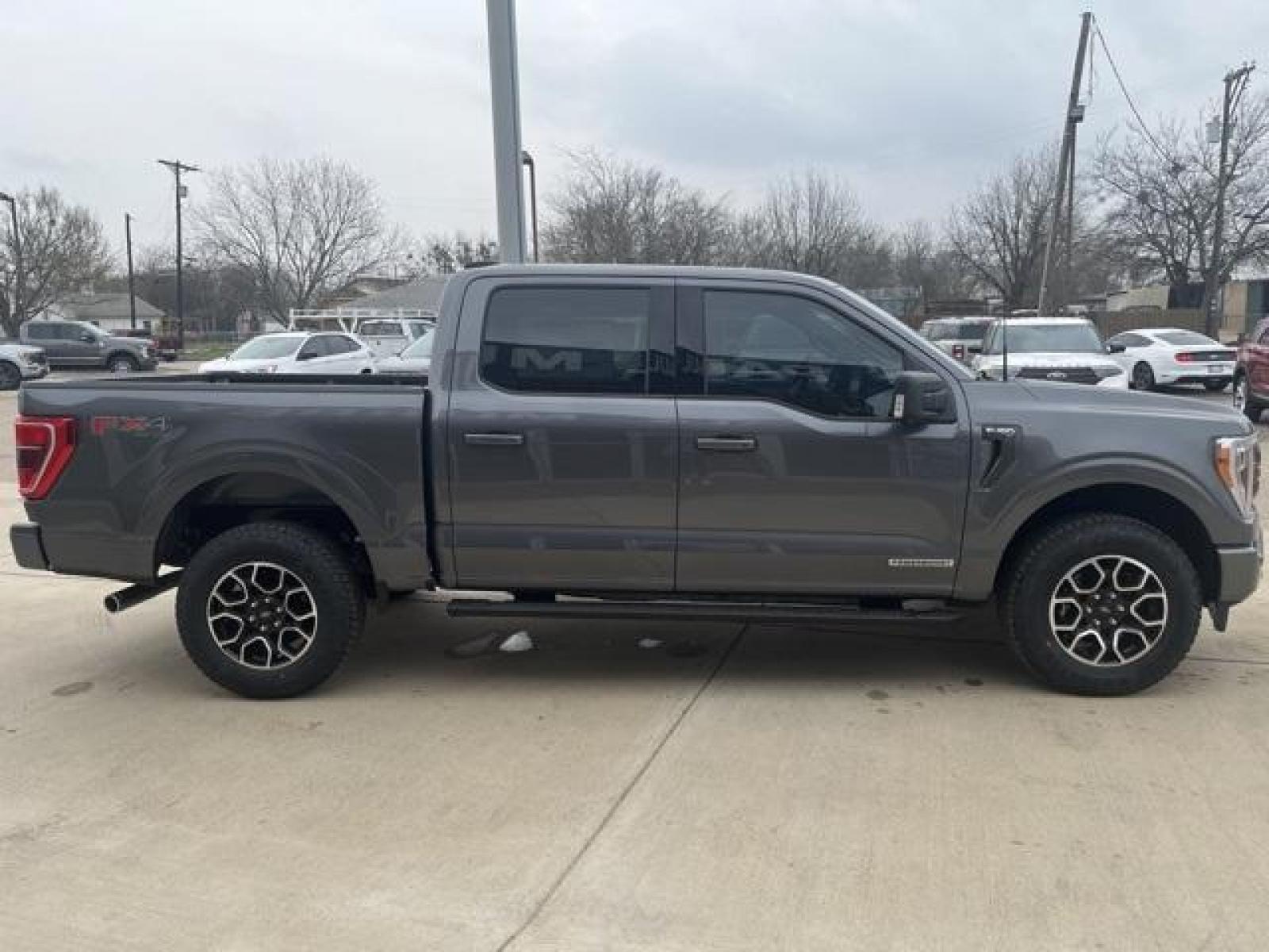 2023 Gray Metallic /Black Ford F-150 XLT (1FTFW1ED8PF) with an 3.5L PowerBoost Full-Hybrid V6 engine, Automatic transmission, located at 1105 E Mulberry, Kaufman, TX, 75142, (972) 962-2151, 32.589550, -96.300926 - Carbonized Gray Metallic 2023 Ford F-150 4D SuperCrew XLT 4WD 10-Speed Automatic 3.5L PowerBoost Full-Hybrid V6 3.5L PowerBoost Full-Hybrid V6, 4WD.<br><br><br>Please call Paul Murrey Ford Inc. In Kaufman Texas A Family Dealership Since 1952 Serving the Dallas Fort Worth and East Texas areas for ove - Photo #7