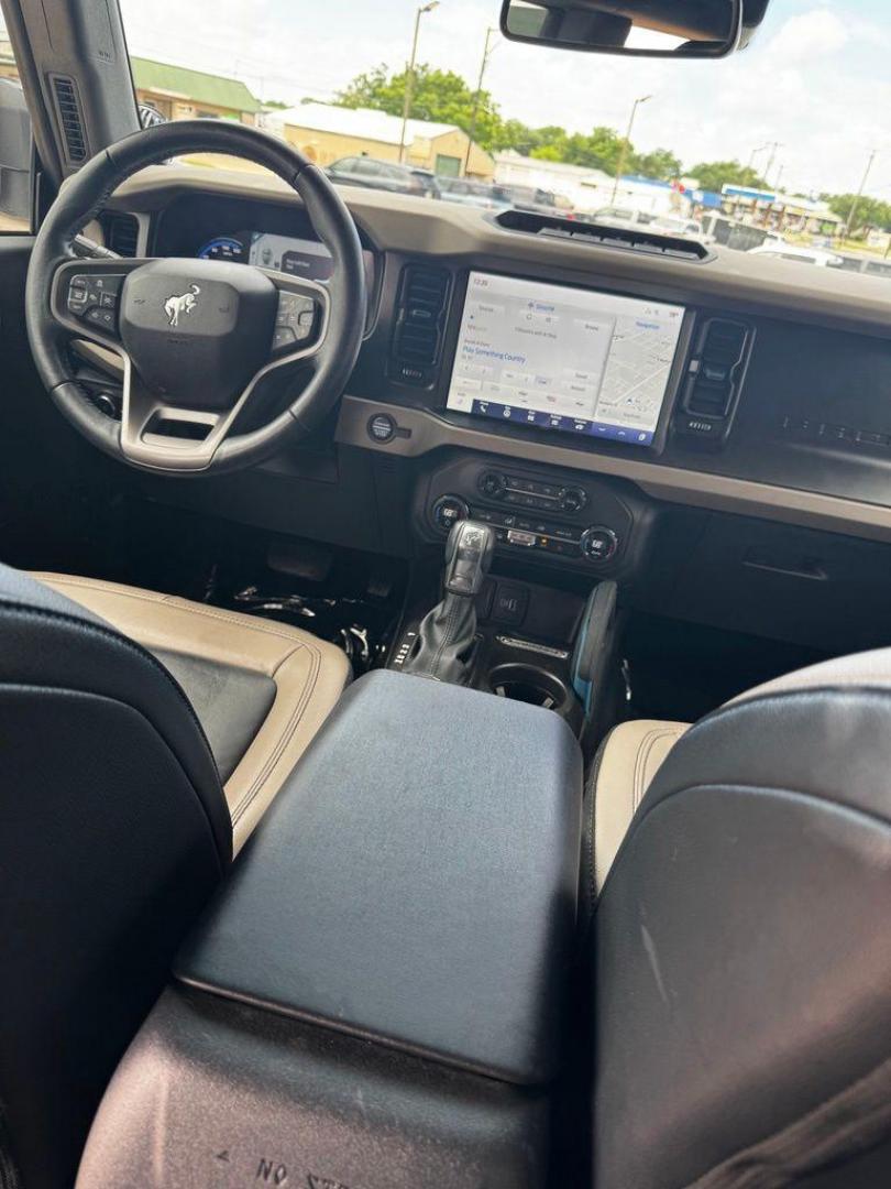 2023 Oxford White /Black Ford Bronco Wildtrak (1FMEE5DP7PL) with an 2.7L EcoBoost V6 engine, Automatic transmission, located at 1105 E Mulberry, Kaufman, TX, 75142, (972) 962-2151, 32.589550, -96.300926 - Oxford White 2023 Ford Bronco 4D Sport Utility Wildtrak 4WD 10-Speed Automatic 2.7L EcoBoost V6 OWNERS BRONCO, NEVER OFF ROAD, HARD TOP, ALL WEATHER MATS.<br><br><br>Recent Arrival! Odometer is 1360 miles below market average!<br><br><br>Please call Paul Murrey Ford Inc. In Kaufman Texas A Family De - Photo#28