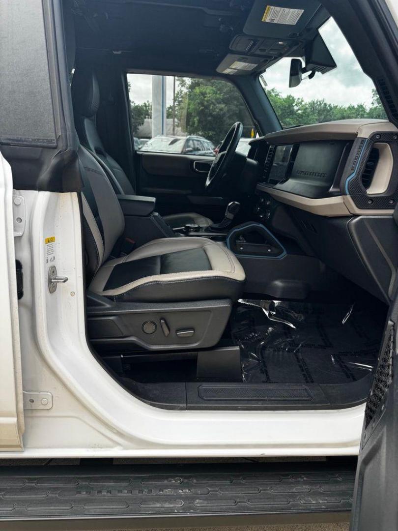2023 Oxford White /Black Ford Bronco Wildtrak (1FMEE5DP7PL) with an 2.7L EcoBoost V6 engine, Automatic transmission, located at 1105 E Mulberry, Kaufman, TX, 75142, (972) 962-2151, 32.589550, -96.300926 - Oxford White 2023 Ford Bronco 4D Sport Utility Wildtrak 4WD 10-Speed Automatic 2.7L EcoBoost V6 OWNERS BRONCO, NEVER OFF ROAD, HARD TOP, ALL WEATHER MATS.<br><br><br>Recent Arrival! Odometer is 1360 miles below market average!<br><br><br>Please call Paul Murrey Ford Inc. In Kaufman Texas A Family De - Photo#32