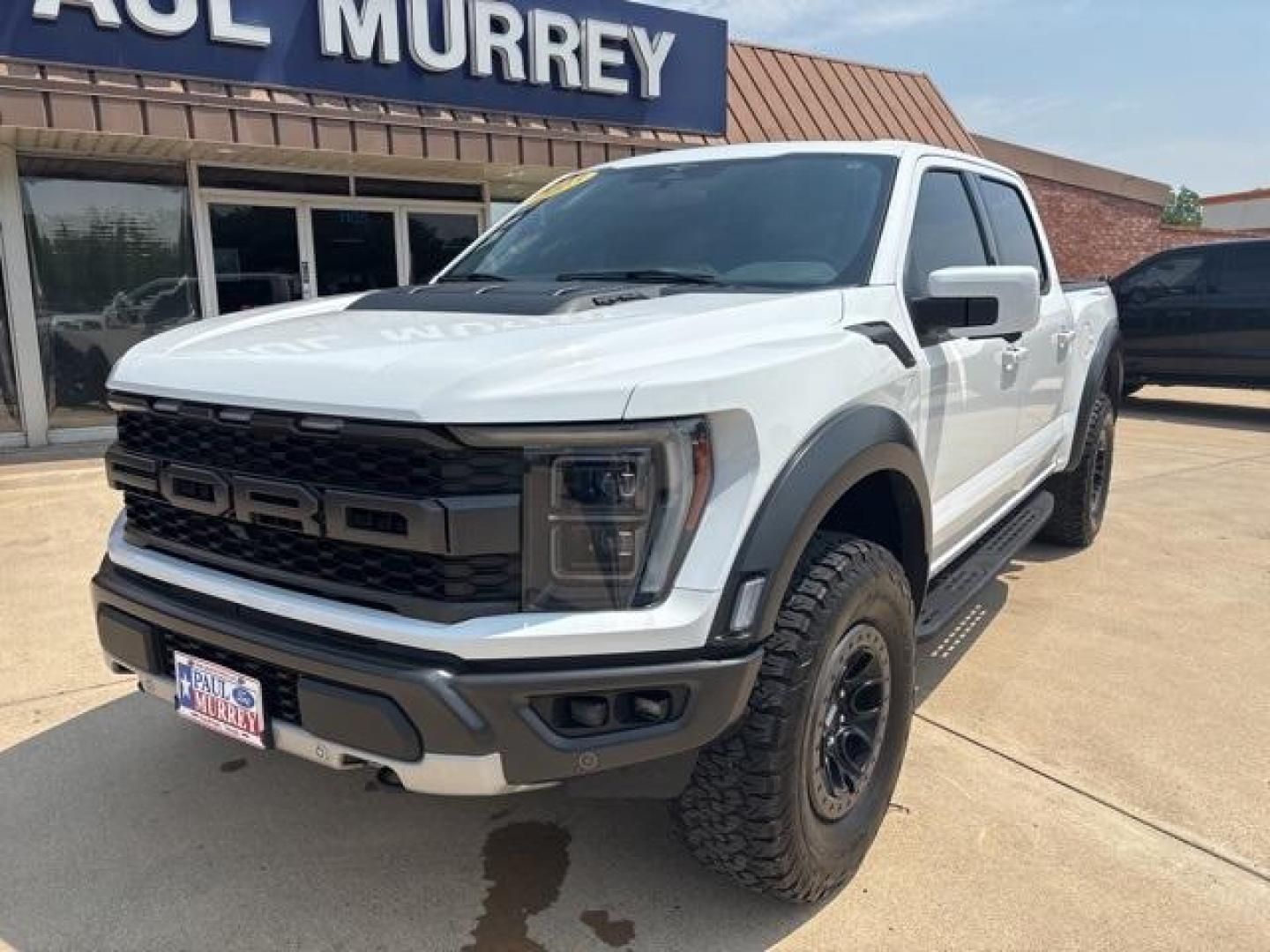 2023 Oxford White /Black Ford F-150 Raptor (1FTFW1RG7PF) with an 3.5L V6 EcoBoost engine, Automatic transmission, located at 1105 E Mulberry, Kaufman, TX, 75142, (972) 962-2151, 32.589550, -96.300926 - Oxford White 2023 Ford F-150 4D SuperCrew Raptor 4WD 10-Speed Automatic 3.5L V6 EcoBoost 4WD. Priced below KBB Fair Purchase Price!<br><br><br>Please call Paul Murrey Ford Inc. In Kaufman Texas A Family Dealership Since 1952 Serving the Dallas Fort Worth and East Texas areas for over 70 years. Pleas - Photo#1