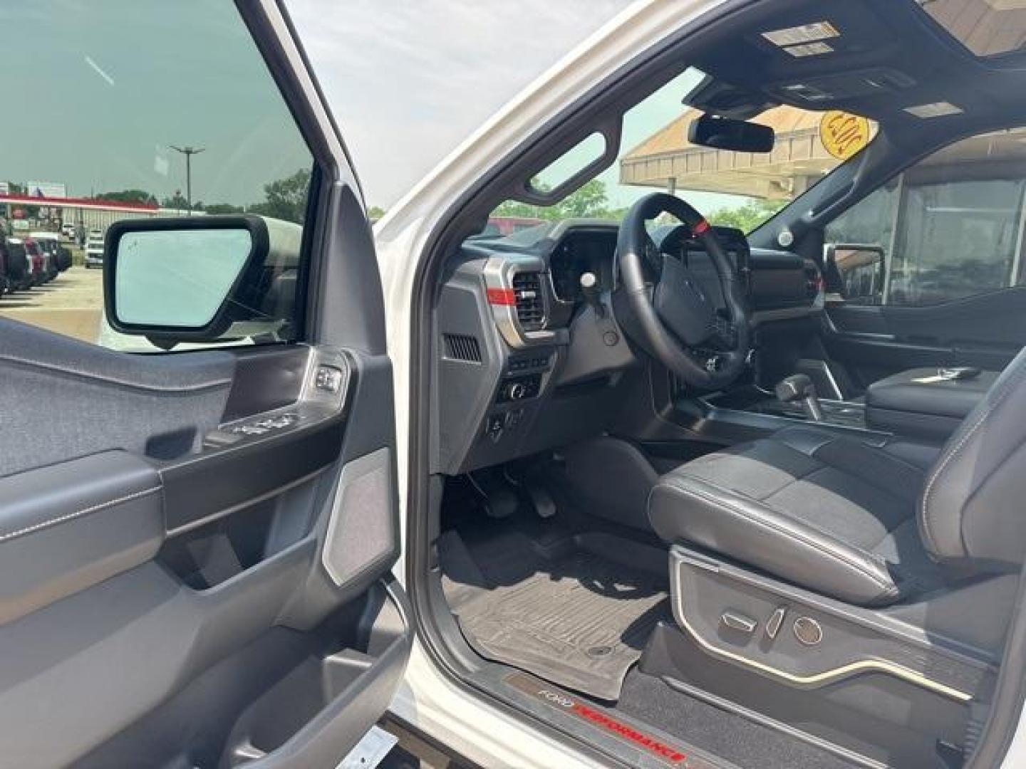 2023 Oxford White /Black Ford F-150 Raptor (1FTFW1RG7PF) with an 3.5L V6 EcoBoost engine, Automatic transmission, located at 1105 E Mulberry, Kaufman, TX, 75142, (972) 962-2151, 32.589550, -96.300926 - Oxford White 2023 Ford F-150 4D SuperCrew Raptor 4WD 10-Speed Automatic 3.5L V6 EcoBoost 4WD. Priced below KBB Fair Purchase Price!<br><br><br>Please call Paul Murrey Ford Inc. In Kaufman Texas A Family Dealership Since 1952 Serving the Dallas Fort Worth and East Texas areas for over 70 years. Pleas - Photo#7