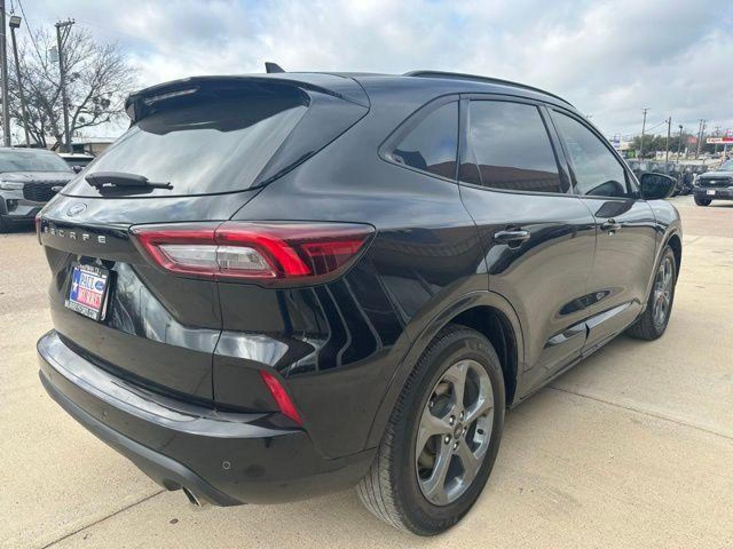 2023 Agate Black Metallic /Ebony With Red Stitching Ford Escape ST-Line (1FMCU0MN4PU) with an 1.5L EcoBoost engine, Automatic transmission, located at 1105 E Mulberry, Kaufman, TX, 75142, (972) 962-2151, 32.589550, -96.300926 - Agate Black Metallic 2023 Ford Escape 4D Sport Utility ST-Line FWD 8-Speed Automatic 1.5L EcoBoost<br><br><br>27/34 City/Highway MPG<br><br><br>Please call Paul Murrey Ford Inc. In Kaufman Texas A Family Dealership Since 1952 Serving the Dallas Fort Worth and East Texas areas for over 70 years. Plea - Photo#3