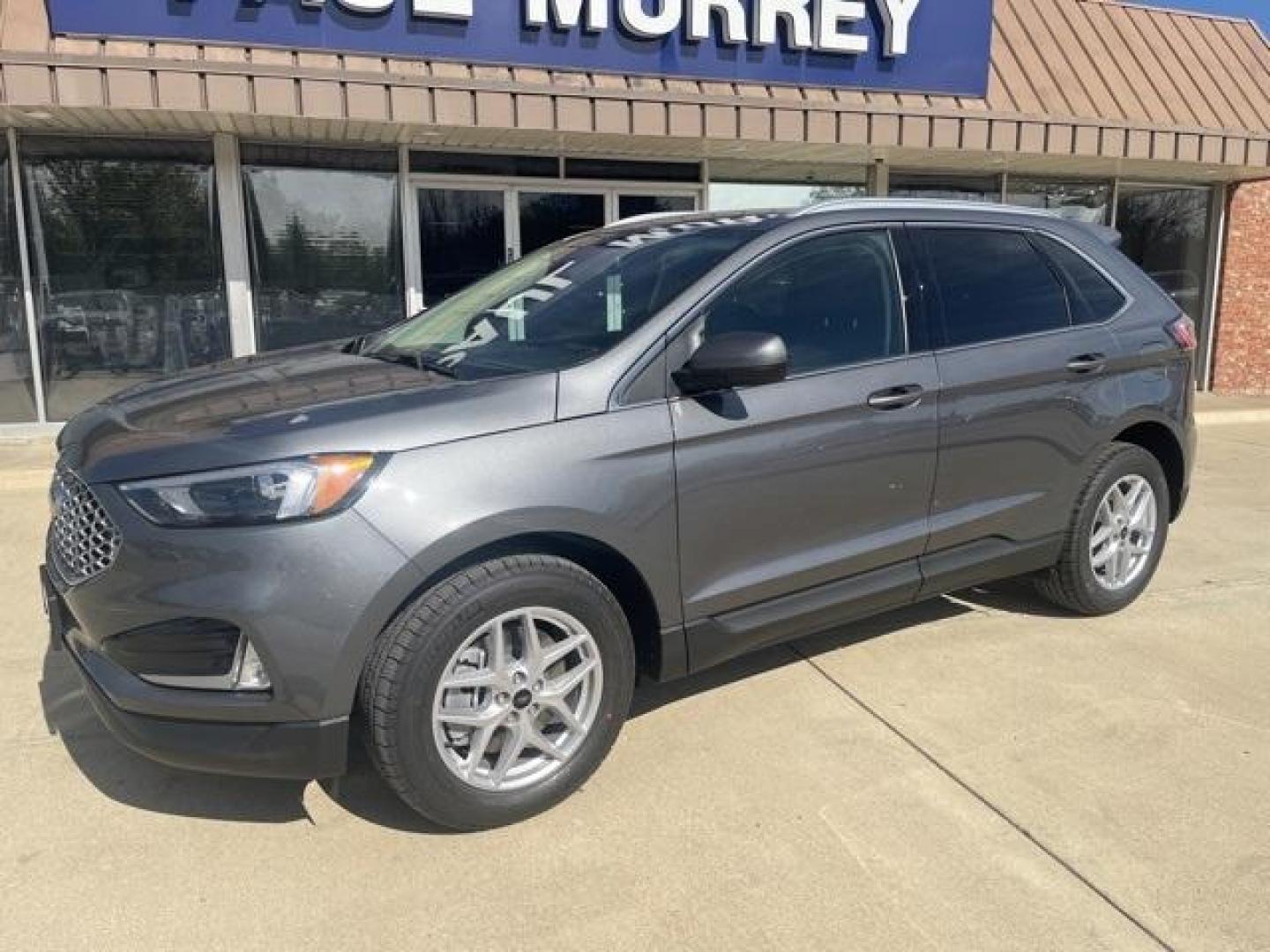 2024 Carbonized Gray Metallic /Ebony Ford Edge SEL (2FMPK4J9XRB) with an EcoBoost 2.0L I4 GTDi DOHC Turbocharged VCT engine, Automatic transmission, located at 1105 E Mulberry, Kaufman, TX, 75142, (972) 962-2151, 32.589550, -96.300926 - Carbonized Gray Metallic 2024 Ford Edge 4D Sport Utility SEL AWD 8-Speed Automatic EcoBoost 2.0L I4 GTDi DOHC Turbocharged VCT AWD.<br><br>21/28 City/Highway MPG<br><br><br>Please call Paul Murrey Ford Inc. In Kaufman Texas A Family Dealership Since 1952 Serving the Dallas Fort Worth and East Texas - Photo#1