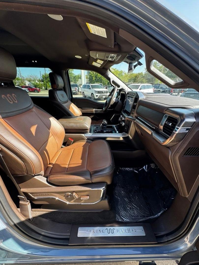 2023 Azure Gray Metallic /Java Ford F-150 King Ranch (1FTFW1E82PF) with an 3.5L V6 EcoBoost engine, Automatic transmission, located at 1105 E Mulberry, Kaufman, TX, 75142, (972) 962-2151, 32.589550, -96.300926 - Azure Gray Metallic 2023 Ford F-150 4D SuperCrew King Ranch 4WD 10-Speed Automatic 3.5L V6 EcoBoost 4WD.<br><br><br>Recent Arrival! Odometer is 9636 miles below market average!<br><br><br>Please call Paul Murrey Ford Inc. In Kaufman Texas A Family Dealership Since 1952 Serving the Dallas Fort Worth- Photo#34