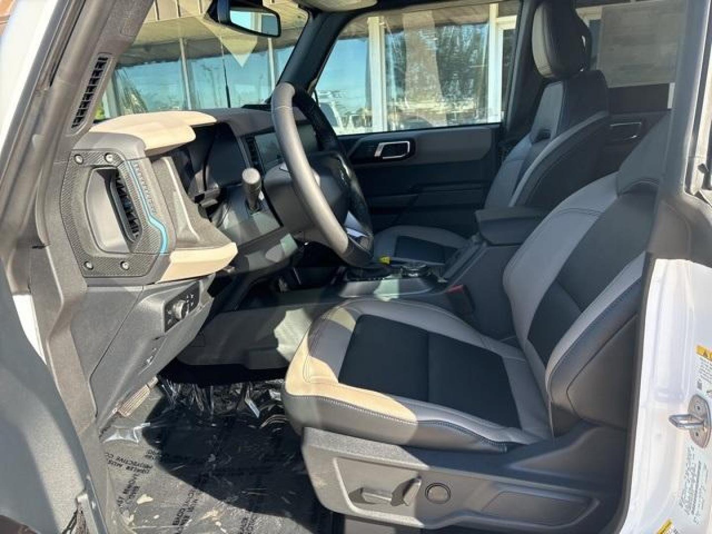 2024 Oxford White /Black Ford Bronco Wildtrak (1FMEE2BP9RL) with an 2.7L EcoBoost V6 engine, Automatic transmission, located at 1105 E Mulberry, Kaufman, TX, 75142, (972) 962-2151, 32.589550, -96.300926 - Oxford White 2024 Ford Bronco 4D Sport Utility Wildtrak 4WD 10-Speed Automatic 2.7L EcoBoost V6<br><br><br>Please call Paul Murrey Ford Inc. In Kaufman Texas A Family Dealership Since 1952 Serving the Dallas Fort Worth and East Texas areas for over 70 years. Please call 972-962-2151 www.murreyford.c - Photo#10