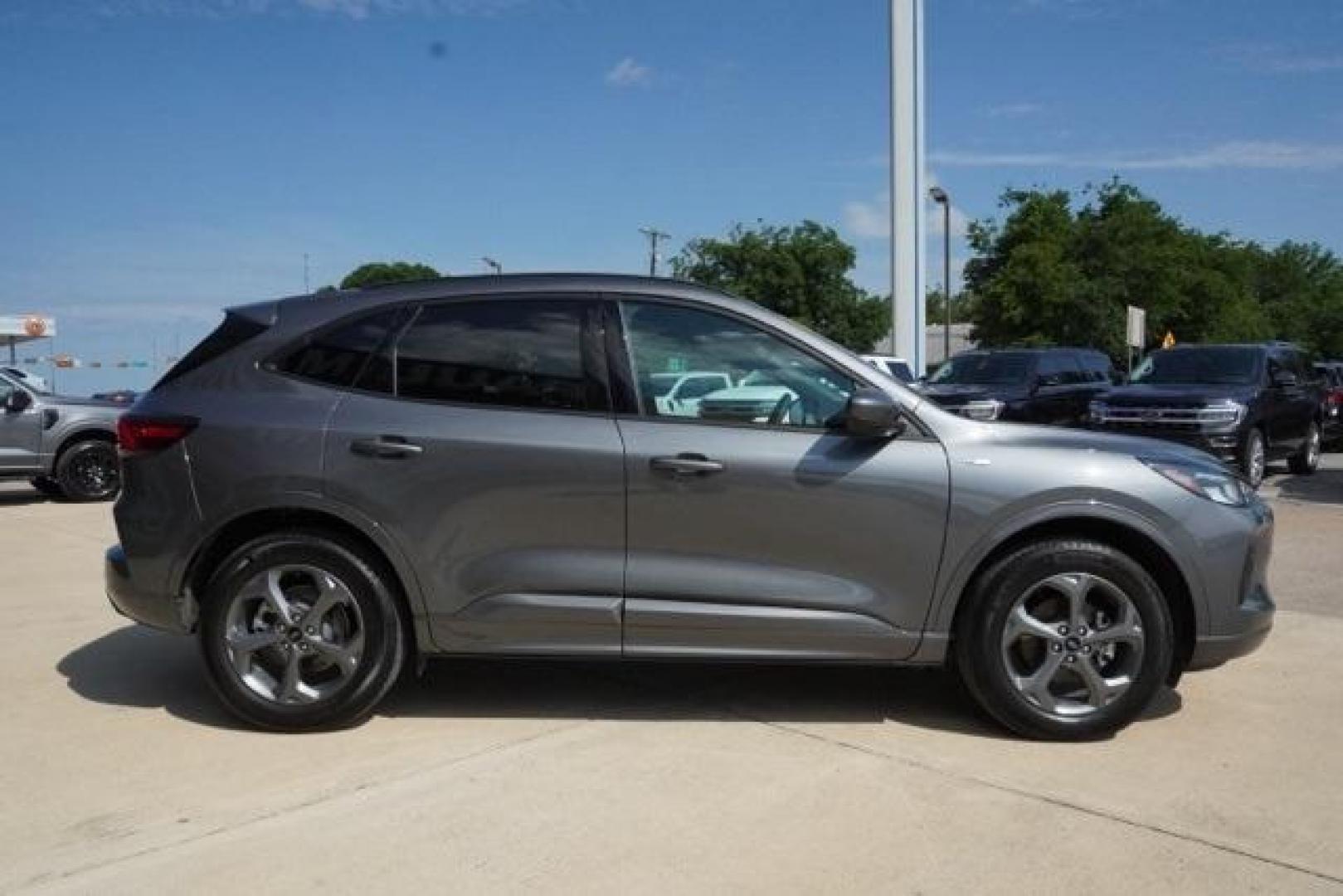2024 Gray Metallic /Ebony Ford Escape ST-Line Select (1FMCU9NA8RU) with an EcoBoost 2.0L I4 GTDi DOHC Turbocharged VCT engine, Automatic transmission, located at 1105 E Mulberry, Kaufman, TX, 75142, (972) 962-2151, 32.589550, -96.300926 - Gray Metallic 2024 Ford Escape 4D Sport Utility ST-Line Select AWD 8-Speed Automatic EcoBoost 2.0L I4 GTDi DOHC Turbocharged VCT AWD.<br><br><br>Recent Arrival! 23/31 City/Highway MPG<br><br><br>Please call Paul Murrey Ford Inc. In Kaufman Texas A Family Dealership Since 1952 Serving the Dallas Fort - Photo#2