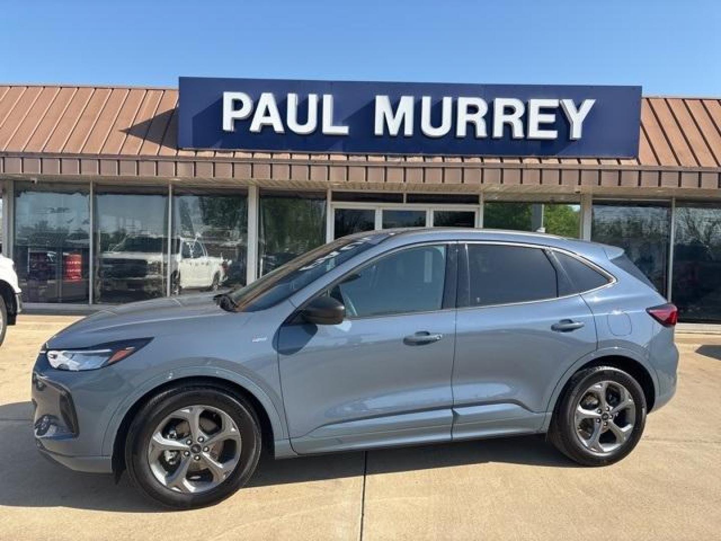 2023 Vapor Blue Metallic /Ebony With Red Stitching Ford Escape ST-Line (1FMCU0MN9PU) with an 1.5L EcoBoost engine, Automatic transmission, located at 1105 E Mulberry, Kaufman, TX, 75142, (972) 962-2151, 32.589550, -96.300926 - Vapor Blue Metallic 2023 Ford Escape 4D Sport Utility ST-Line FWD 8-Speed Automatic 1.5L EcoBoost<br><br><br>Recent Arrival! Odometer is 23078 miles below market average! 27/34 City/Highway MPG<br><br><br>Please call Paul Murrey Ford Inc. In Kaufman Texas A Family Dealership Since 1952 Serving the D - Photo#0