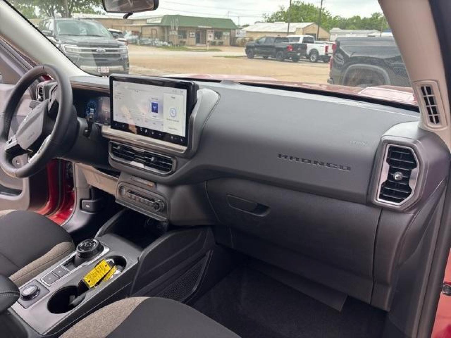 2025 Ruby Red Metallic Tinted Clearcoat /Med Light Smoked Truffle Trim Ford Bronco Sport Big Bend (3FMCR9BN9SR) with an 1.5L EcoBoost engine, Automatic transmission, located at 1105 E Mulberry, Kaufman, TX, 75142, (972) 962-2151, 32.589550, -96.300926 - Ruby Red Metallic 2025 Ford Bronco Sport 4D Sport Utility Big Bend 4WD 8-Speed Automatic 1.5L EcoBoost<br><br>Recent Arrival! 25/29 City/Highway MPG<br><br><br>Please call Paul Murrey Ford Inc. In Kaufman Texas A Family Dealership Since 1952 Serving the Dallas Fort Worth and East Texas areas for ove - Photo#17