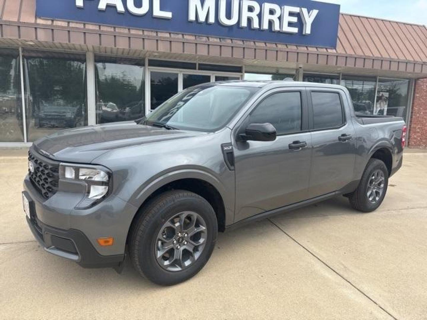 2025 Carbonized Gray Metallic /Blue Ford Maverick XLT (3FTTW8H37SR) with an 2.5L I-4 Hybrid engine, CVT transmission, located at 1105 E Mulberry, Kaufman, TX, 75142, (972) 962-2151, 32.589550, -96.300926 - Carbonized Gray Metallic 2025 Ford Maverick 4D Crew Cab XLT FWD CVT 2.5L I-4 Hybrid 2.5L I-4 Hybrid.<br><br>42/35 City/Highway MPG<br><br><br>Please call Paul Murrey Ford Inc. In Kaufman Texas A Family Dealership Since 1952 Serving the Dallas Fort Worth and East Texas areas for over 70 years. Please - Photo#2