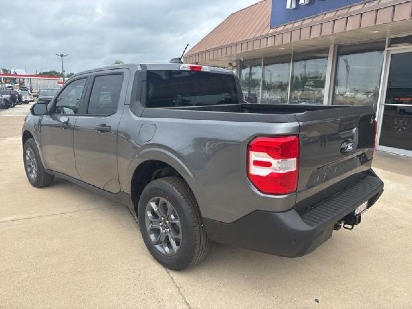2025 Carbonized Gray Metallic /Blue Ford Maverick XLT (3FTTW8H37SR) with an 2.5L I-4 Hybrid engine, CVT transmission, located at 1105 E Mulberry, Kaufman, TX, 75142, (972) 962-2151, 32.589550, -96.300926 - Carbonized Gray Metallic 2025 Ford Maverick 4D Crew Cab XLT FWD CVT 2.5L I-4 Hybrid 2.5L I-4 Hybrid.<br><br>42/35 City/Highway MPG<br><br><br>Please call Paul Murrey Ford Inc. In Kaufman Texas A Family Dealership Since 1952 Serving the Dallas Fort Worth and East Texas areas for over 70 years. Please - Photo#3