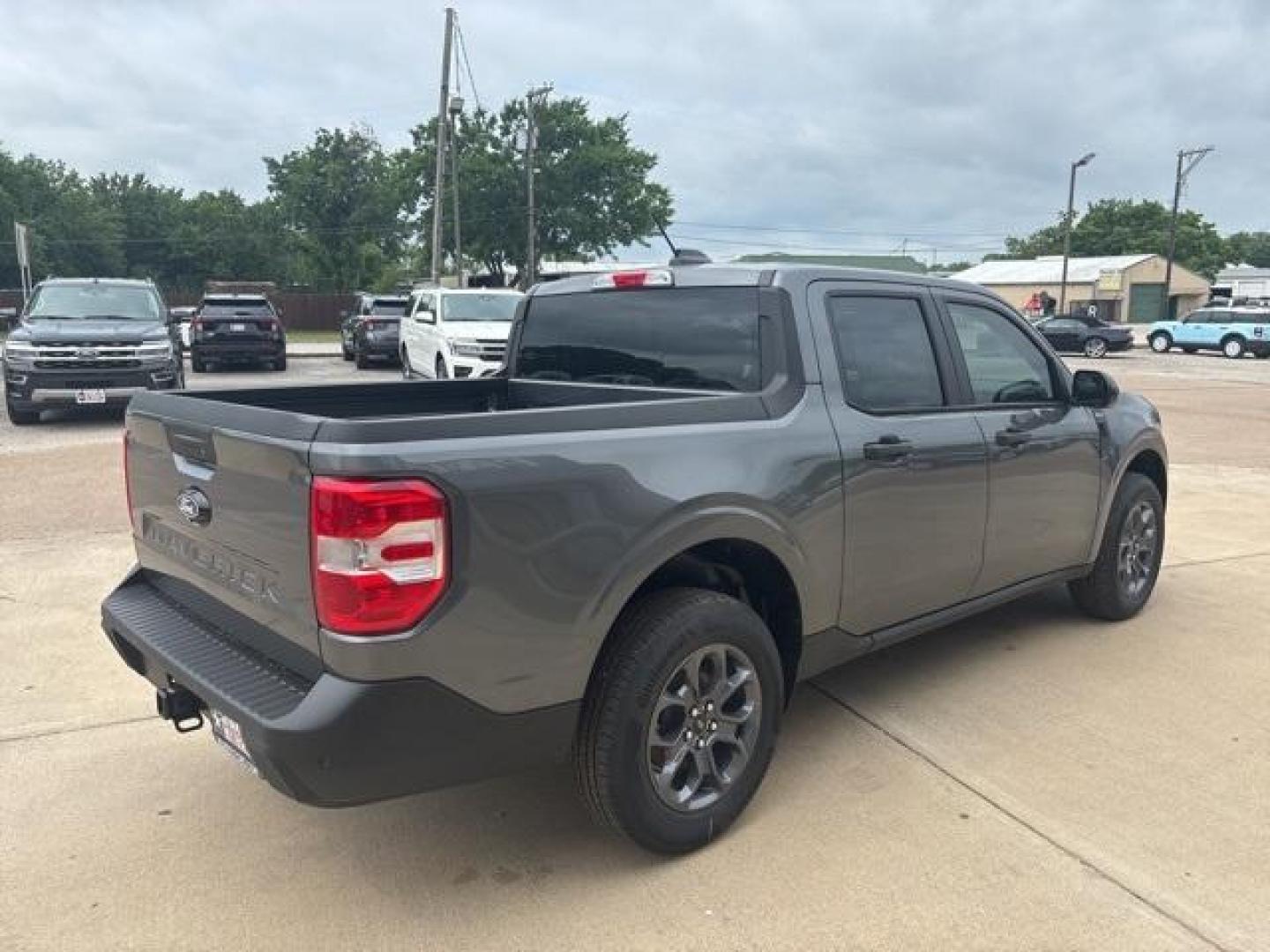 2025 Carbonized Gray Metallic /Blue Ford Maverick XLT (3FTTW8H37SR) with an 2.5L I-4 Hybrid engine, CVT transmission, located at 1105 E Mulberry, Kaufman, TX, 75142, (972) 962-2151, 32.589550, -96.300926 - Carbonized Gray Metallic 2025 Ford Maverick 4D Crew Cab XLT FWD CVT 2.5L I-4 Hybrid 2.5L I-4 Hybrid.<br><br>42/35 City/Highway MPG<br><br><br>Please call Paul Murrey Ford Inc. In Kaufman Texas A Family Dealership Since 1952 Serving the Dallas Fort Worth and East Texas areas for over 70 years. Please - Photo#5