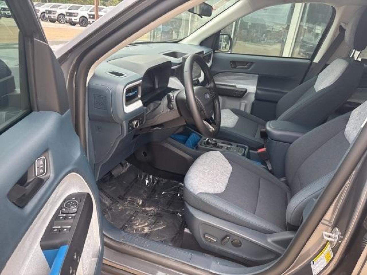 2025 Carbonized Gray Metallic /Blue Ford Maverick XLT (3FTTW8H37SR) with an 2.5L I-4 Hybrid engine, CVT transmission, located at 1105 E Mulberry, Kaufman, TX, 75142, (972) 962-2151, 32.589550, -96.300926 - Carbonized Gray Metallic 2025 Ford Maverick 4D Crew Cab XLT FWD CVT 2.5L I-4 Hybrid 2.5L I-4 Hybrid.<br><br>42/35 City/Highway MPG<br><br><br>Please call Paul Murrey Ford Inc. In Kaufman Texas A Family Dealership Since 1952 Serving the Dallas Fort Worth and East Texas areas for over 70 years. Please - Photo#9