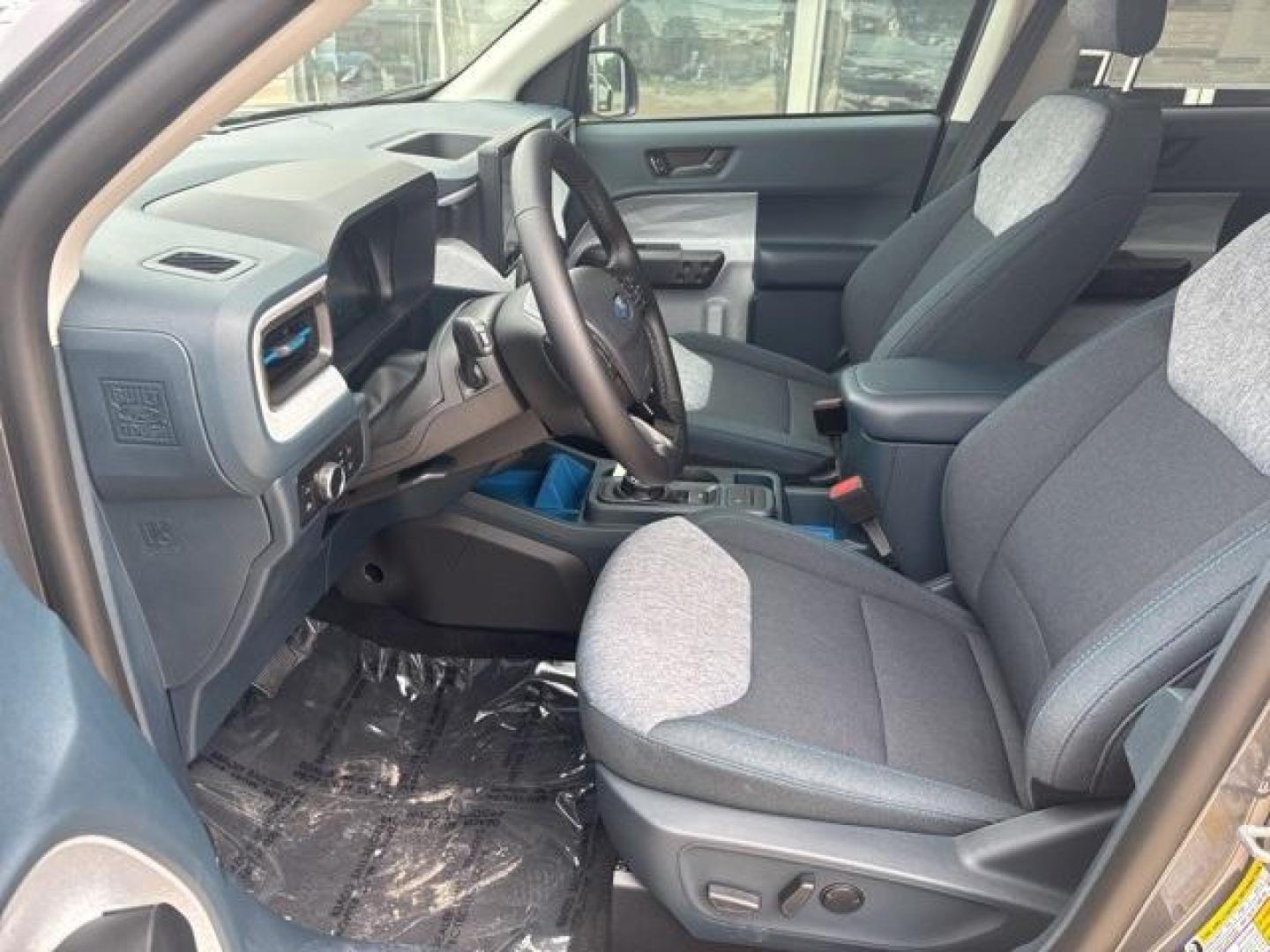 2025 Carbonized Gray Metallic /Blue Ford Maverick XLT (3FTTW8H37SR) with an 2.5L I-4 Hybrid engine, CVT transmission, located at 1105 E Mulberry, Kaufman, TX, 75142, (972) 962-2151, 32.589550, -96.300926 - Carbonized Gray Metallic 2025 Ford Maverick 4D Crew Cab XLT FWD CVT 2.5L I-4 Hybrid 2.5L I-4 Hybrid.<br><br>42/35 City/Highway MPG<br><br><br>Please call Paul Murrey Ford Inc. In Kaufman Texas A Family Dealership Since 1952 Serving the Dallas Fort Worth and East Texas areas for over 70 years. Please - Photo#10