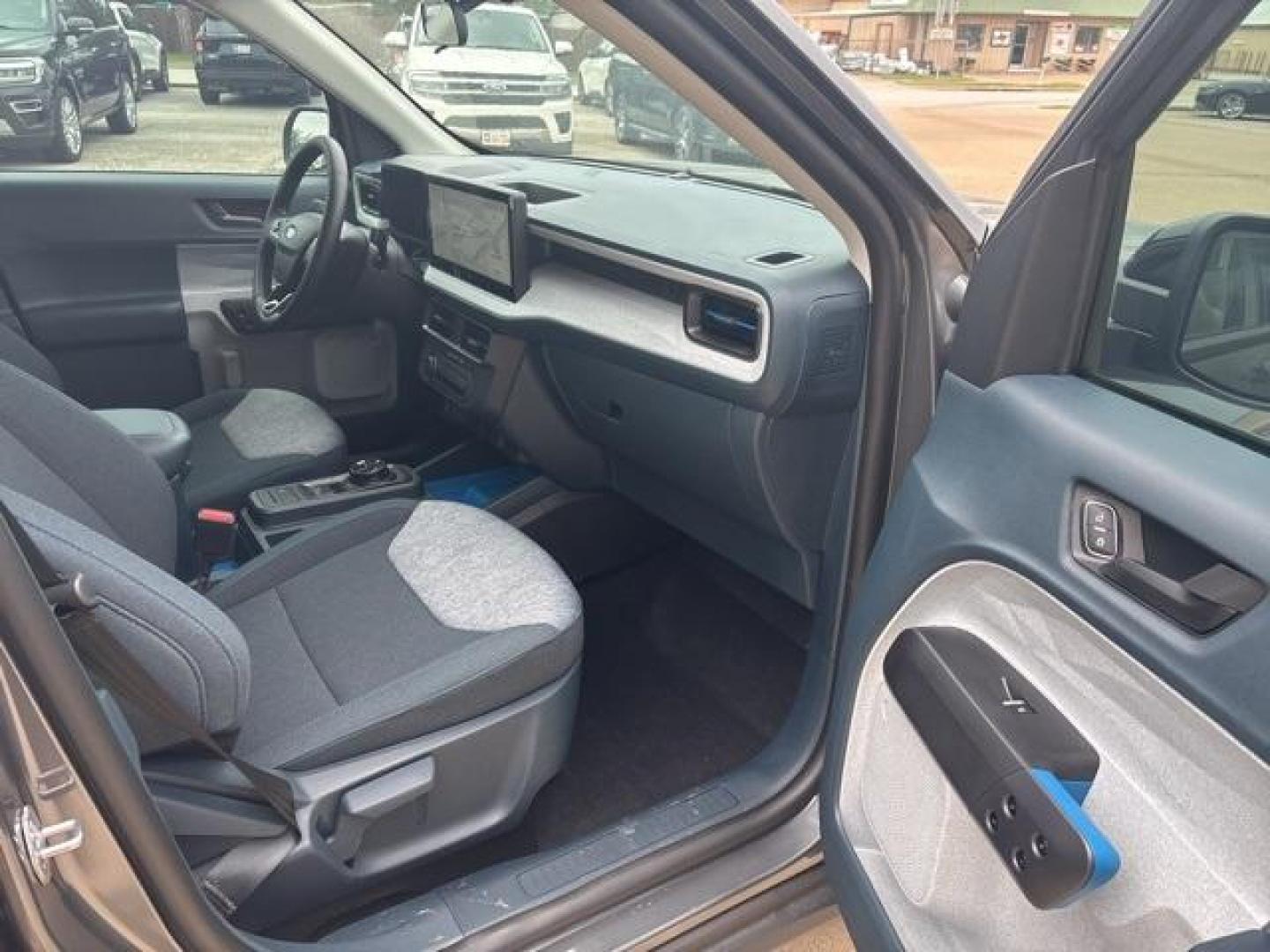 2025 Carbonized Gray Metallic /Blue Ford Maverick XLT (3FTTW8H37SR) with an 2.5L I-4 Hybrid engine, CVT transmission, located at 1105 E Mulberry, Kaufman, TX, 75142, (972) 962-2151, 32.589550, -96.300926 - Carbonized Gray Metallic 2025 Ford Maverick 4D Crew Cab XLT FWD CVT 2.5L I-4 Hybrid 2.5L I-4 Hybrid.<br><br>42/35 City/Highway MPG<br><br><br>Please call Paul Murrey Ford Inc. In Kaufman Texas A Family Dealership Since 1952 Serving the Dallas Fort Worth and East Texas areas for over 70 years. Please - Photo#14