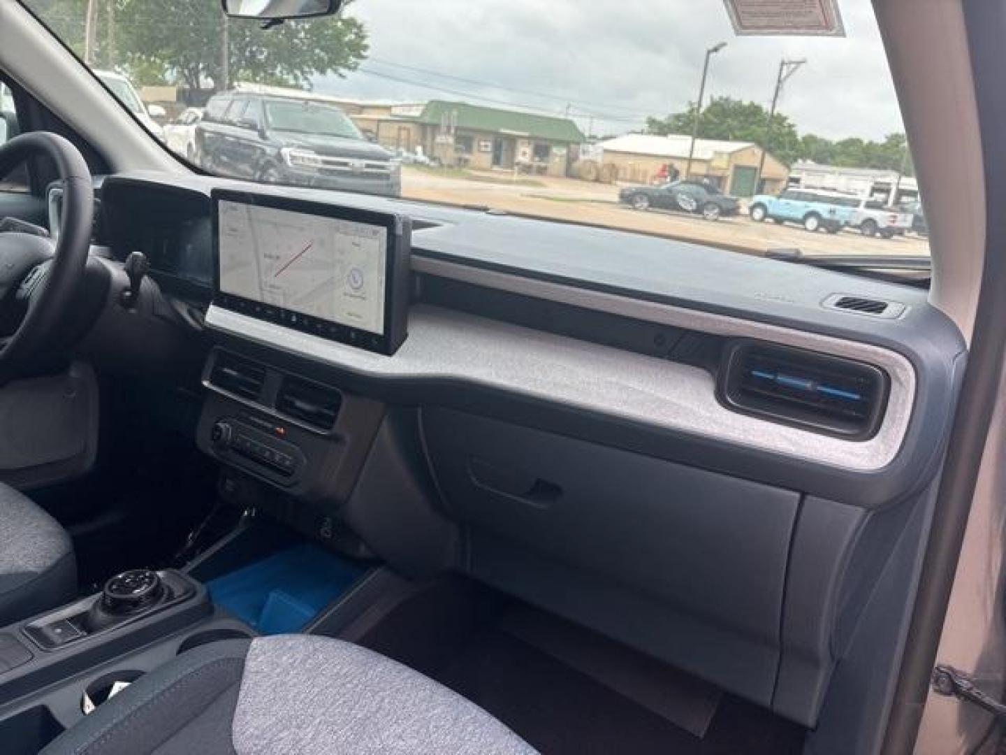 2025 Carbonized Gray Metallic /Blue Ford Maverick XLT (3FTTW8H37SR) with an 2.5L I-4 Hybrid engine, CVT transmission, located at 1105 E Mulberry, Kaufman, TX, 75142, (972) 962-2151, 32.589550, -96.300926 - Carbonized Gray Metallic 2025 Ford Maverick 4D Crew Cab XLT FWD CVT 2.5L I-4 Hybrid 2.5L I-4 Hybrid.<br><br>42/35 City/Highway MPG<br><br><br>Please call Paul Murrey Ford Inc. In Kaufman Texas A Family Dealership Since 1952 Serving the Dallas Fort Worth and East Texas areas for over 70 years. Please - Photo#15