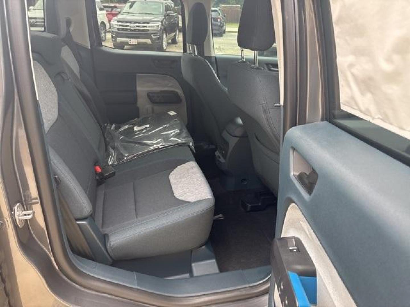 2025 Carbonized Gray Metallic /Blue Ford Maverick XLT (3FTTW8H37SR) with an 2.5L I-4 Hybrid engine, CVT transmission, located at 1105 E Mulberry, Kaufman, TX, 75142, (972) 962-2151, 32.589550, -96.300926 - Carbonized Gray Metallic 2025 Ford Maverick 4D Crew Cab XLT FWD CVT 2.5L I-4 Hybrid 2.5L I-4 Hybrid.<br><br>42/35 City/Highway MPG<br><br><br>Please call Paul Murrey Ford Inc. In Kaufman Texas A Family Dealership Since 1952 Serving the Dallas Fort Worth and East Texas areas for over 70 years. Please - Photo#16