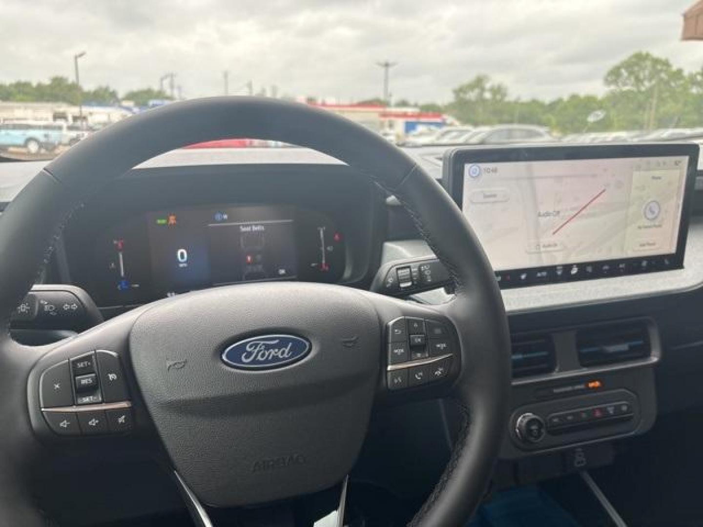 2025 Carbonized Gray Metallic /Blue Ford Maverick XLT (3FTTW8H37SR) with an 2.5L I-4 Hybrid engine, CVT transmission, located at 1105 E Mulberry, Kaufman, TX, 75142, (972) 962-2151, 32.589550, -96.300926 - Carbonized Gray Metallic 2025 Ford Maverick 4D Crew Cab XLT FWD CVT 2.5L I-4 Hybrid 2.5L I-4 Hybrid.<br><br>42/35 City/Highway MPG<br><br><br>Please call Paul Murrey Ford Inc. In Kaufman Texas A Family Dealership Since 1952 Serving the Dallas Fort Worth and East Texas areas for over 70 years. Please - Photo#17