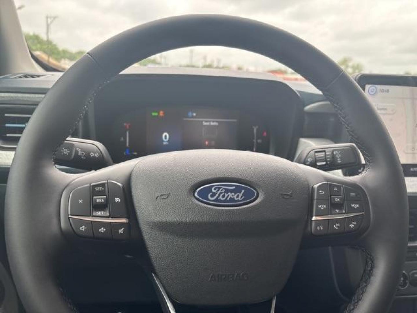 2025 Carbonized Gray Metallic /Blue Ford Maverick XLT (3FTTW8H37SR) with an 2.5L I-4 Hybrid engine, CVT transmission, located at 1105 E Mulberry, Kaufman, TX, 75142, (972) 962-2151, 32.589550, -96.300926 - Carbonized Gray Metallic 2025 Ford Maverick 4D Crew Cab XLT FWD CVT 2.5L I-4 Hybrid 2.5L I-4 Hybrid.<br><br>42/35 City/Highway MPG<br><br><br>Please call Paul Murrey Ford Inc. In Kaufman Texas A Family Dealership Since 1952 Serving the Dallas Fort Worth and East Texas areas for over 70 years. Please - Photo#18