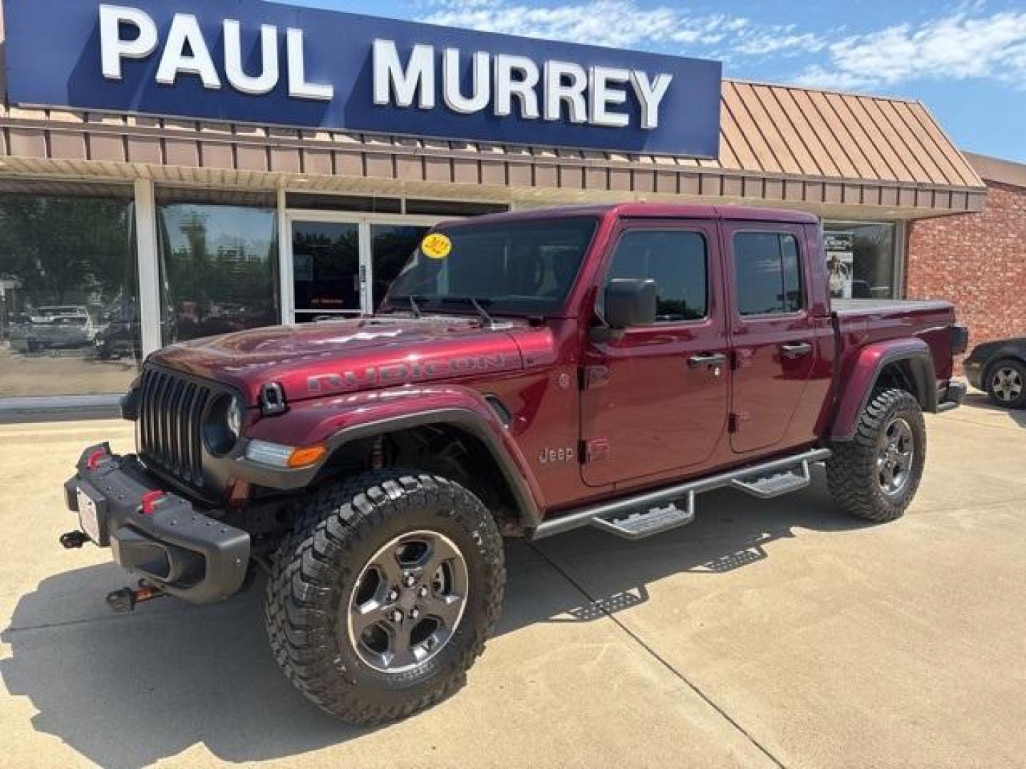 2022 Snazzberry Pearlcoat /Black Jeep Gladiator Rubicon (1C6JJTBG7NL) with an 3.6L V6 24V VVT engine, Automatic transmission, located at 1105 E Mulberry, Kaufman, TX, 75142, (972) 962-2151, 32.589550, -96.300926 - Snazzberry Pearlcoat 2022 Jeep Gladiator 4D Crew Cab Rubicon 4WD 8-Speed Automatic 3.6L V6 24V VVT<br><br><br>Recent Arrival! Odometer is 27586 miles below market average!<br><br><br>Please call Paul Murrey Ford Inc. In Kaufman Texas A Family Dealership Since 1952 Serving the Dallas Fort Worth and E - Photo#2