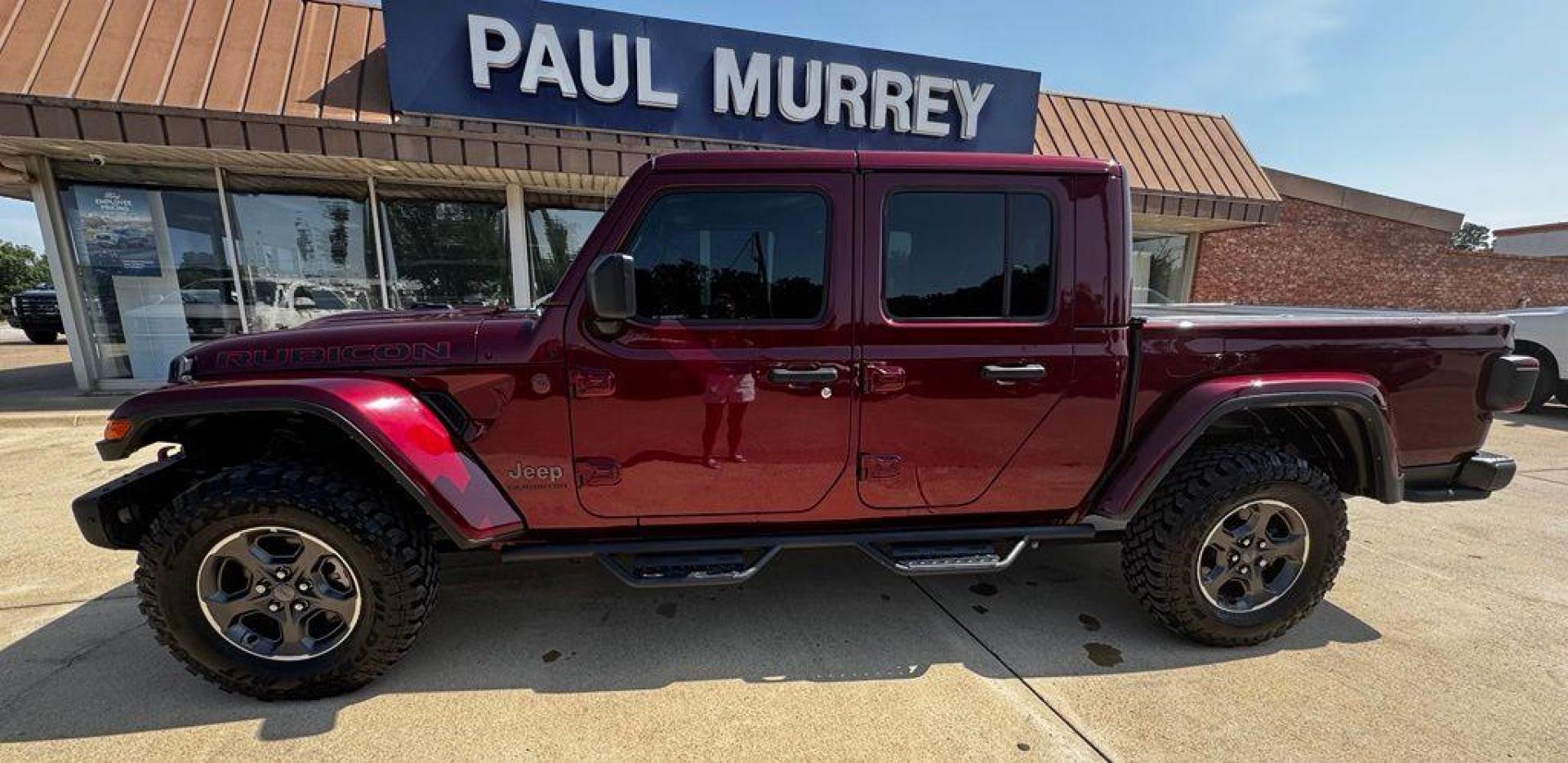 2022 Snazzberry Pearlcoat /Black Jeep Gladiator Rubicon (1C6JJTBG7NL) with an 3.6L V6 24V VVT engine, Automatic transmission, located at 1105 E Mulberry, Kaufman, TX, 75142, (972) 962-2151, 32.589550, -96.300926 - Snazzberry Pearlcoat 2022 Jeep Gladiator 4D Crew Cab Rubicon 4WD 8-Speed Automatic 3.6L V6 24V VVT Priced below KBB Fair Purchase Price!<br><br><br>Recent Arrival! Odometer is 48175 miles below market average!<br><br><br>Please call Paul Murrey Ford Inc. In Kaufman Texas A Family Dealership Since 19 - Photo#0