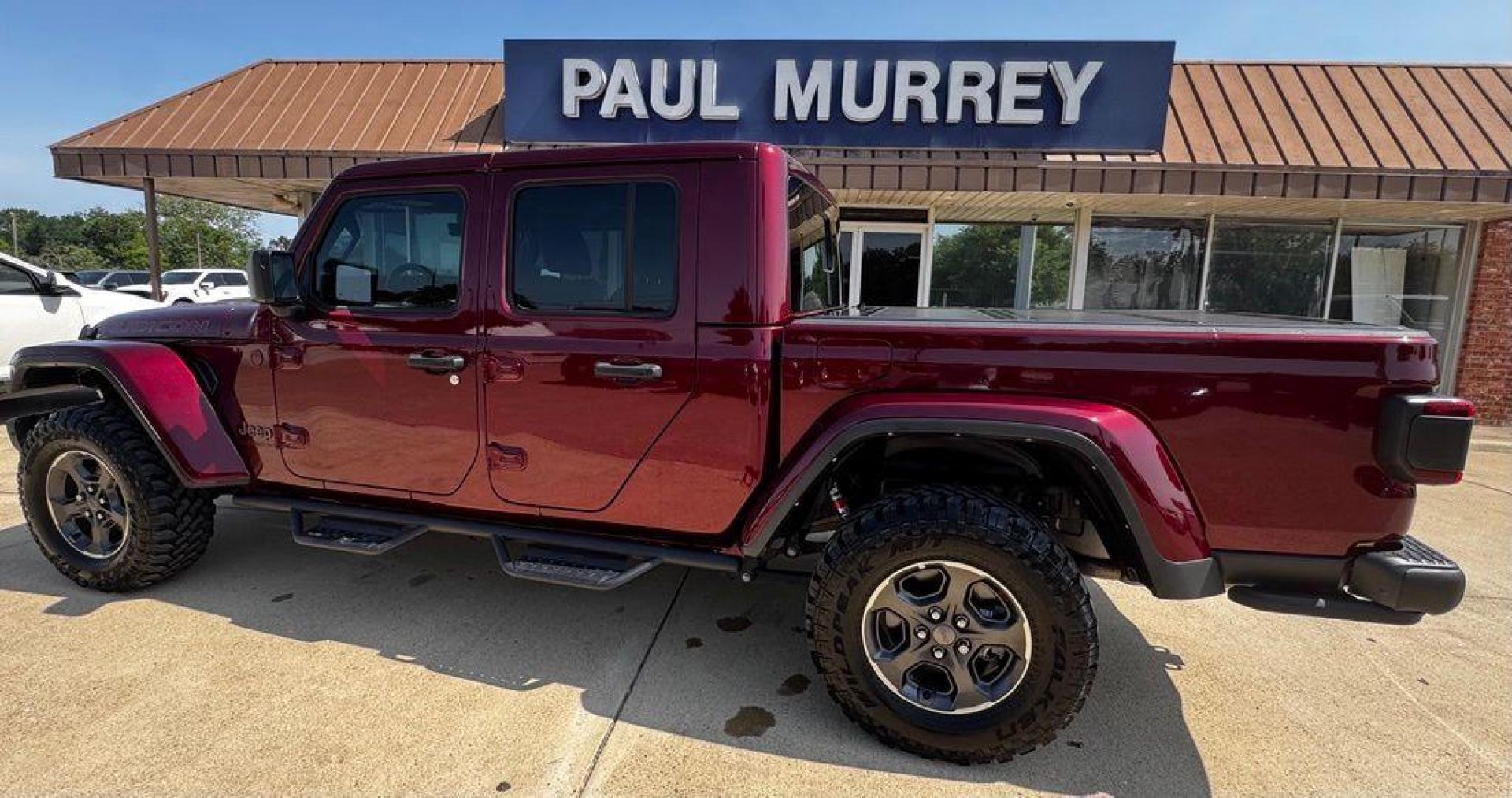 2022 Snazzberry Pearlcoat /Black Jeep Gladiator Rubicon (1C6JJTBG7NL) with an 3.6L V6 24V VVT engine, Automatic transmission, located at 1105 E Mulberry, Kaufman, TX, 75142, (972) 962-2151, 32.589550, -96.300926 - Snazzberry Pearlcoat 2022 Jeep Gladiator 4D Crew Cab Rubicon 4WD 8-Speed Automatic 3.6L V6 24V VVT Priced below KBB Fair Purchase Price!<br><br><br>Recent Arrival! Odometer is 48175 miles below market average!<br><br><br>Please call Paul Murrey Ford Inc. In Kaufman Texas A Family Dealership Since 19 - Photo#1