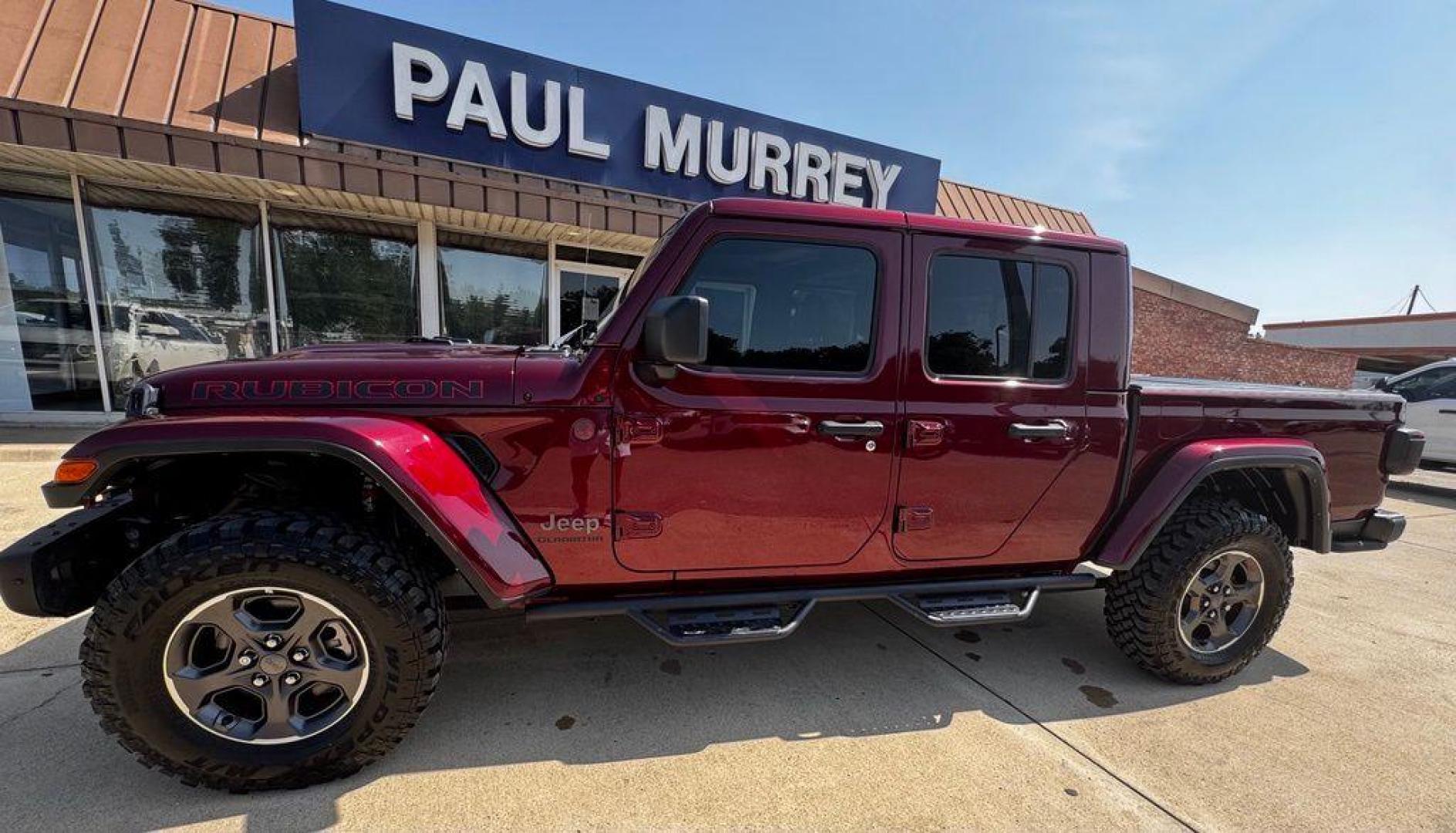 2022 Snazzberry Pearlcoat /Black Jeep Gladiator Rubicon (1C6JJTBG7NL) with an 3.6L V6 24V VVT engine, Automatic transmission, located at 1105 E Mulberry, Kaufman, TX, 75142, (972) 962-2151, 32.589550, -96.300926 - Snazzberry Pearlcoat 2022 Jeep Gladiator 4D Crew Cab Rubicon 4WD 8-Speed Automatic 3.6L V6 24V VVT Priced below KBB Fair Purchase Price!<br><br><br>Recent Arrival! Odometer is 48175 miles below market average!<br><br><br>Please call Paul Murrey Ford Inc. In Kaufman Texas A Family Dealership Since 19 - Photo#2