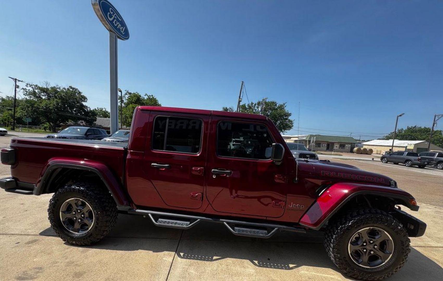 2022 Snazzberry Pearlcoat /Black Jeep Gladiator Rubicon (1C6JJTBG7NL) with an 3.6L V6 24V VVT engine, Automatic transmission, located at 1105 E Mulberry, Kaufman, TX, 75142, (972) 962-2151, 32.589550, -96.300926 - Snazzberry Pearlcoat 2022 Jeep Gladiator 4D Crew Cab Rubicon 4WD 8-Speed Automatic 3.6L V6 24V VVT Priced below KBB Fair Purchase Price!<br><br><br>Recent Arrival! Odometer is 48175 miles below market average!<br><br><br>Please call Paul Murrey Ford Inc. In Kaufman Texas A Family Dealership Since 19 - Photo#12